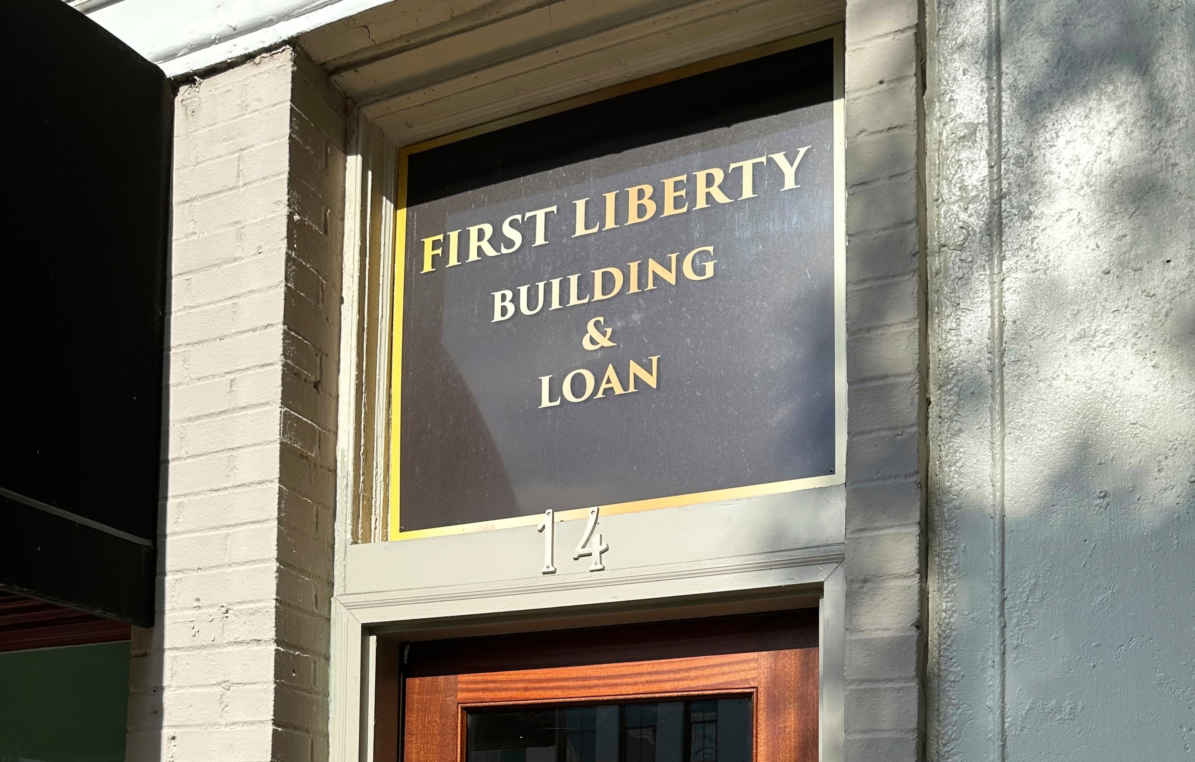 The office of First Liberty Building and Loan, which federal officials allege was a Ponzi scheme, is seen on July 10, 2025, in Newnan. (Jeff Amy/AP)