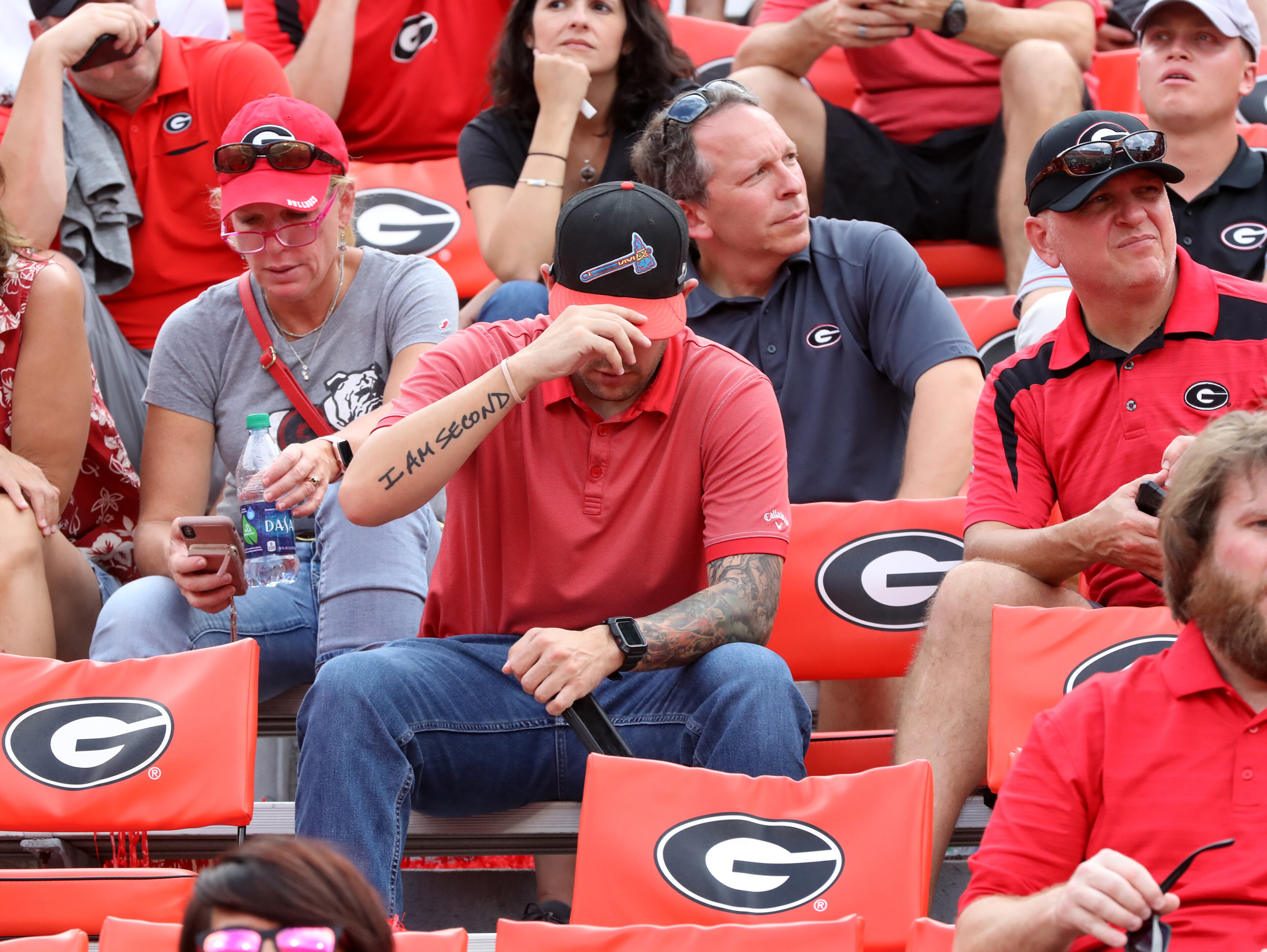 A Georgia fan wearing his Braves hat suffers his second big loss in days as Georgia falls to South Carolina. Curtis Compton/ccompton@ajc.com