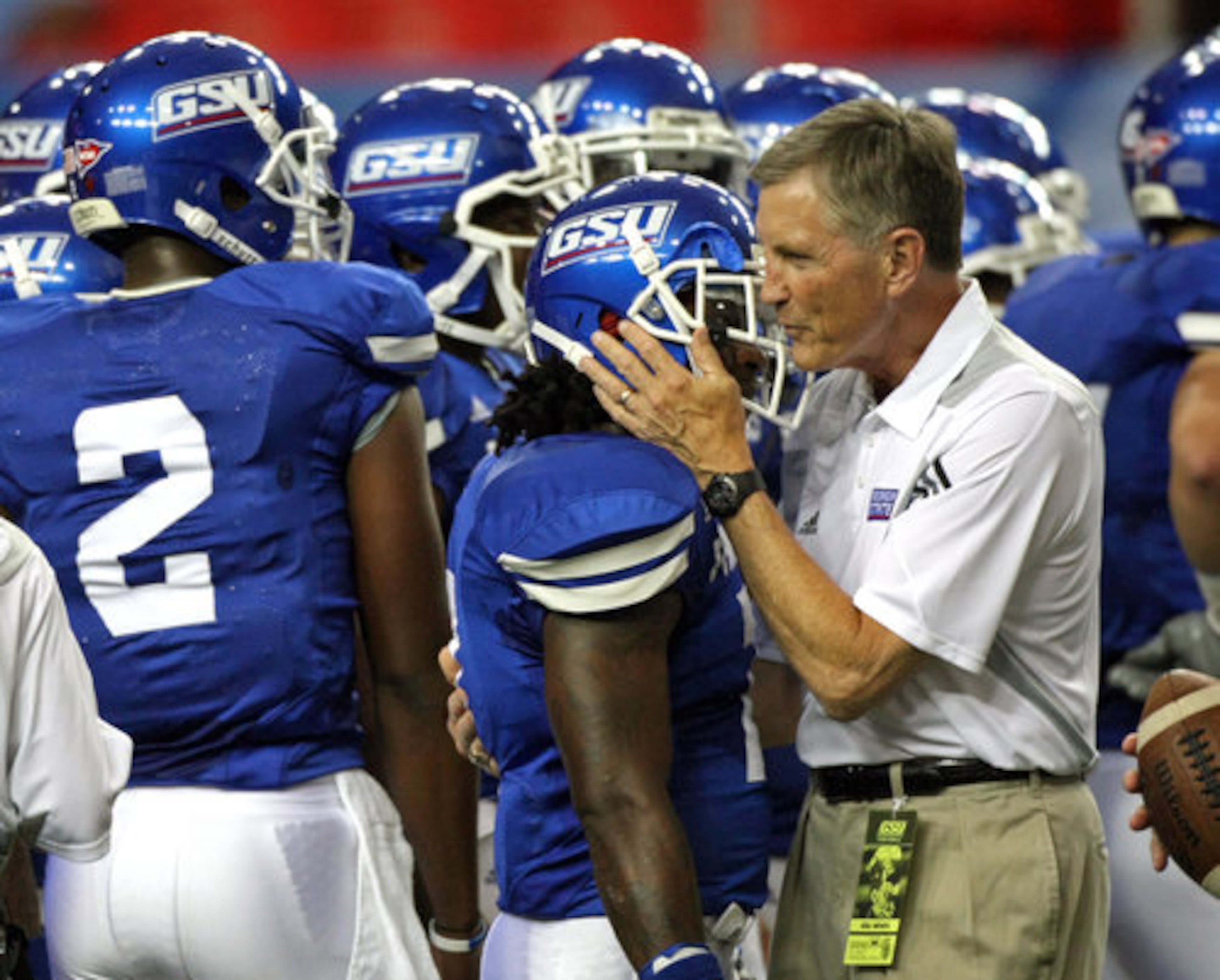 GSU coach Bill Curry has a word with running back Parris Lee (7) before their game against Shorter College in the Georgia Dome Thursday night in Atlanta, Ga., Sept. 2, 2010.