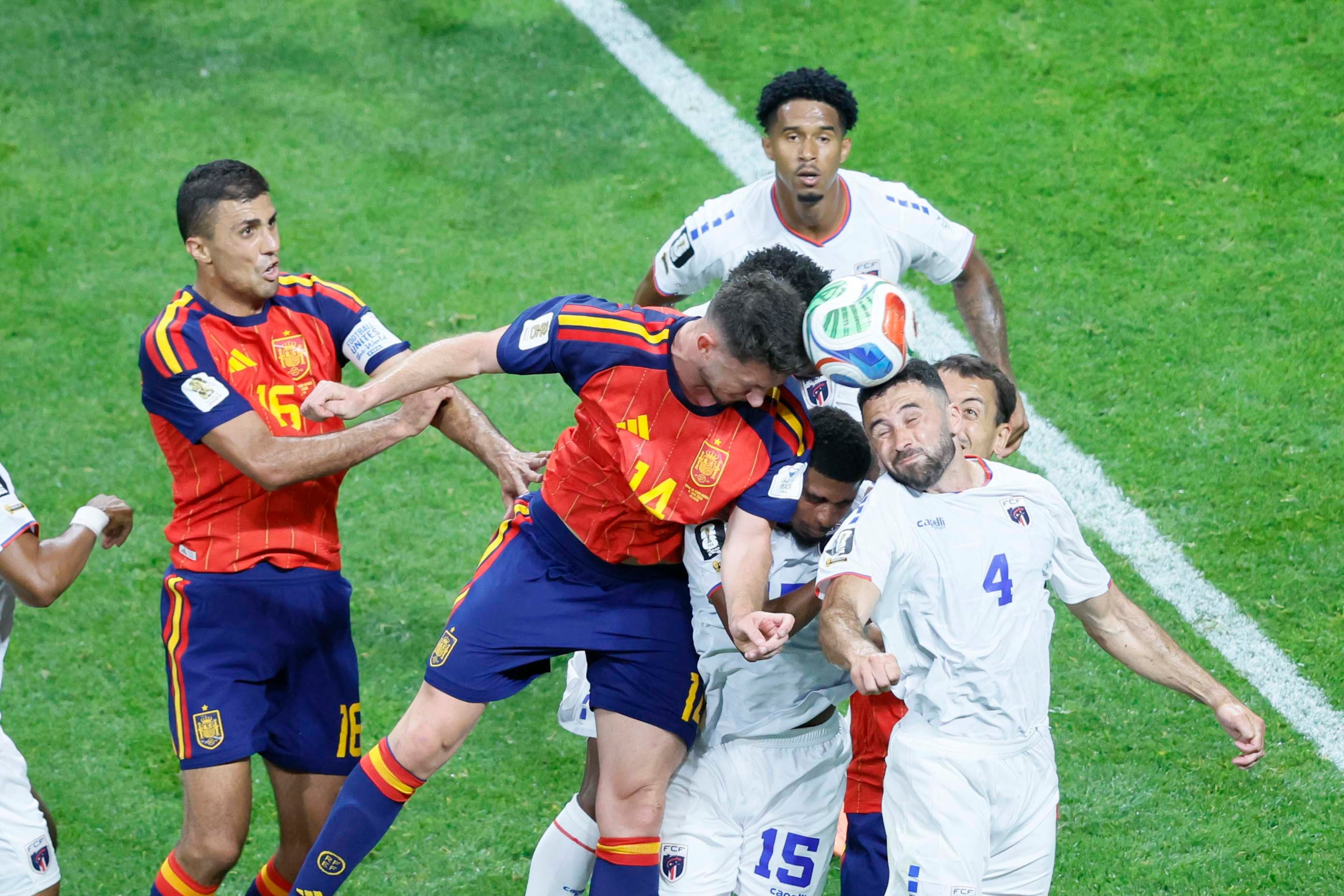 Cape Verde defender Roberto Lopes (right) jumps for a header against Spain defender Aymeric Laporte during a World Cup Group H soccer match at Atlanta Stadium (Mercedes-Benz Stadium) on Monday, June 15, 2026. (Miguel Martinez/AJC)