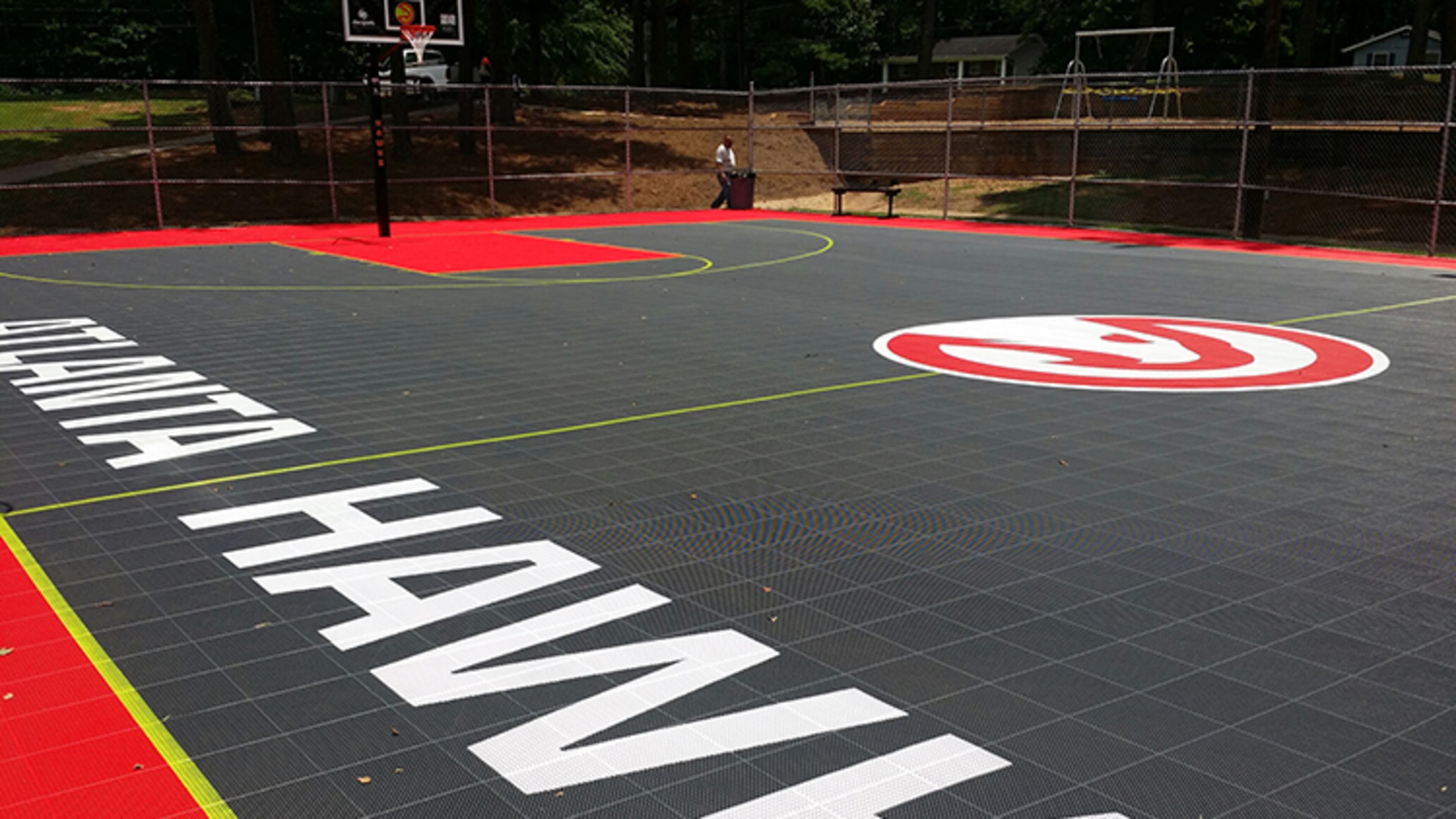 Last year the Atlanta Hawks Foundation refurbished the basketball court at N.H. Scott Recreation Center. This weekend, the foundation will partner with the DeKalb County Department of Recreation, Parks & Cultural Affairs to host a back-to-school giveaway. due to delays caused by inclement weather at the construction site. CONTRIBUTED