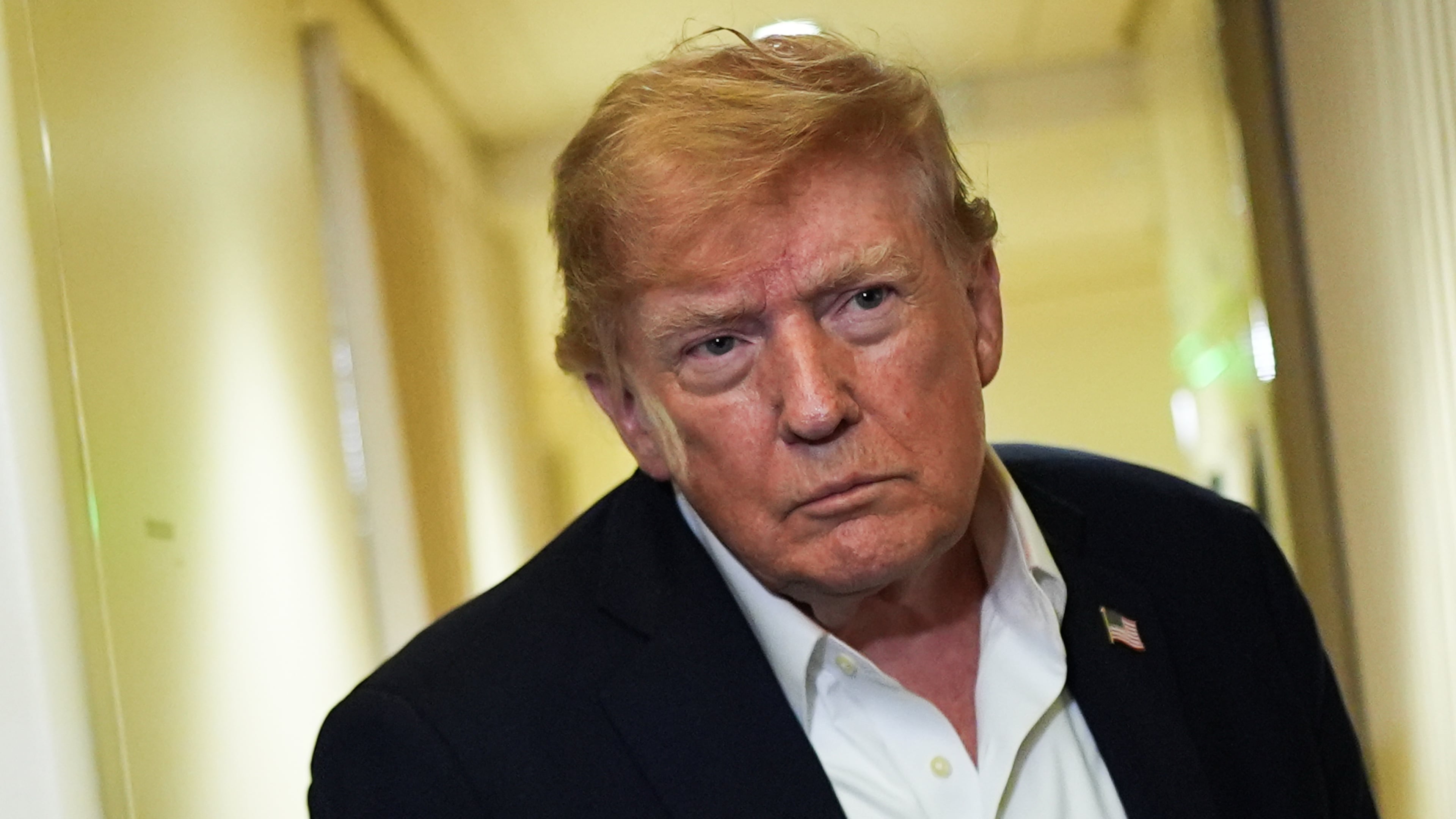 President Donald Trump speaks with reporters while in flight on Air Force One from Shannon, Ireland to Joint Base Andrews, Md., Sunday, Sept. 13, 2026. (AP Photo/Julia Demaree Nikhinson)