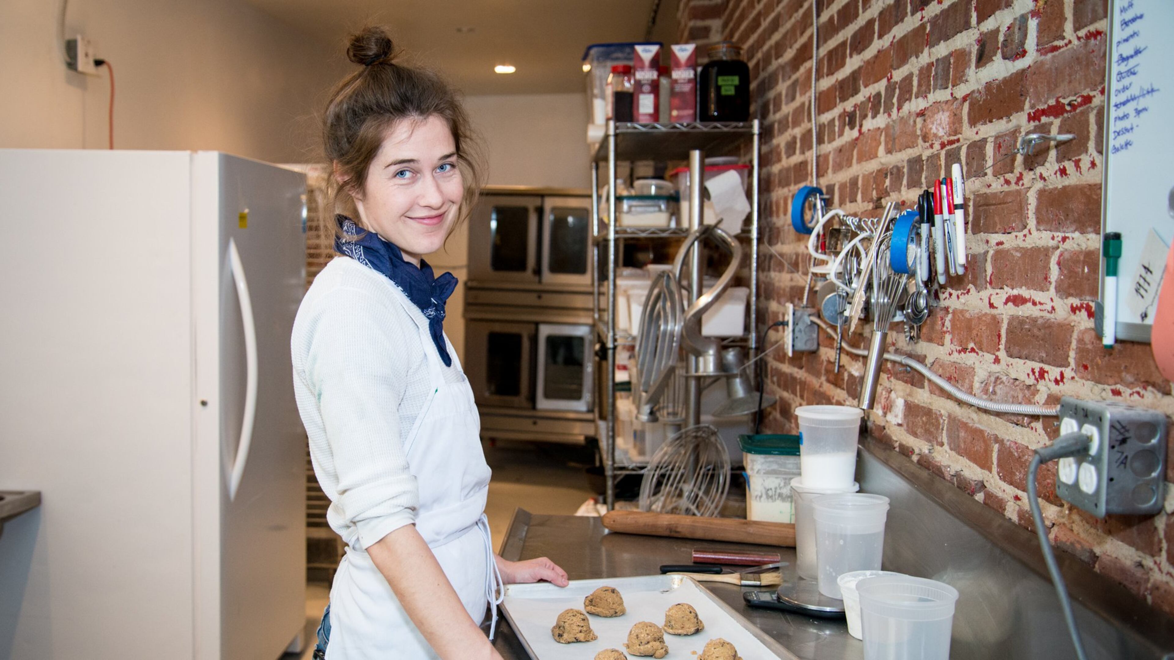 8Arm pastry chef Sarah Dodge in her kitchen prepping cookies. Photo credit- Mia Yakel.