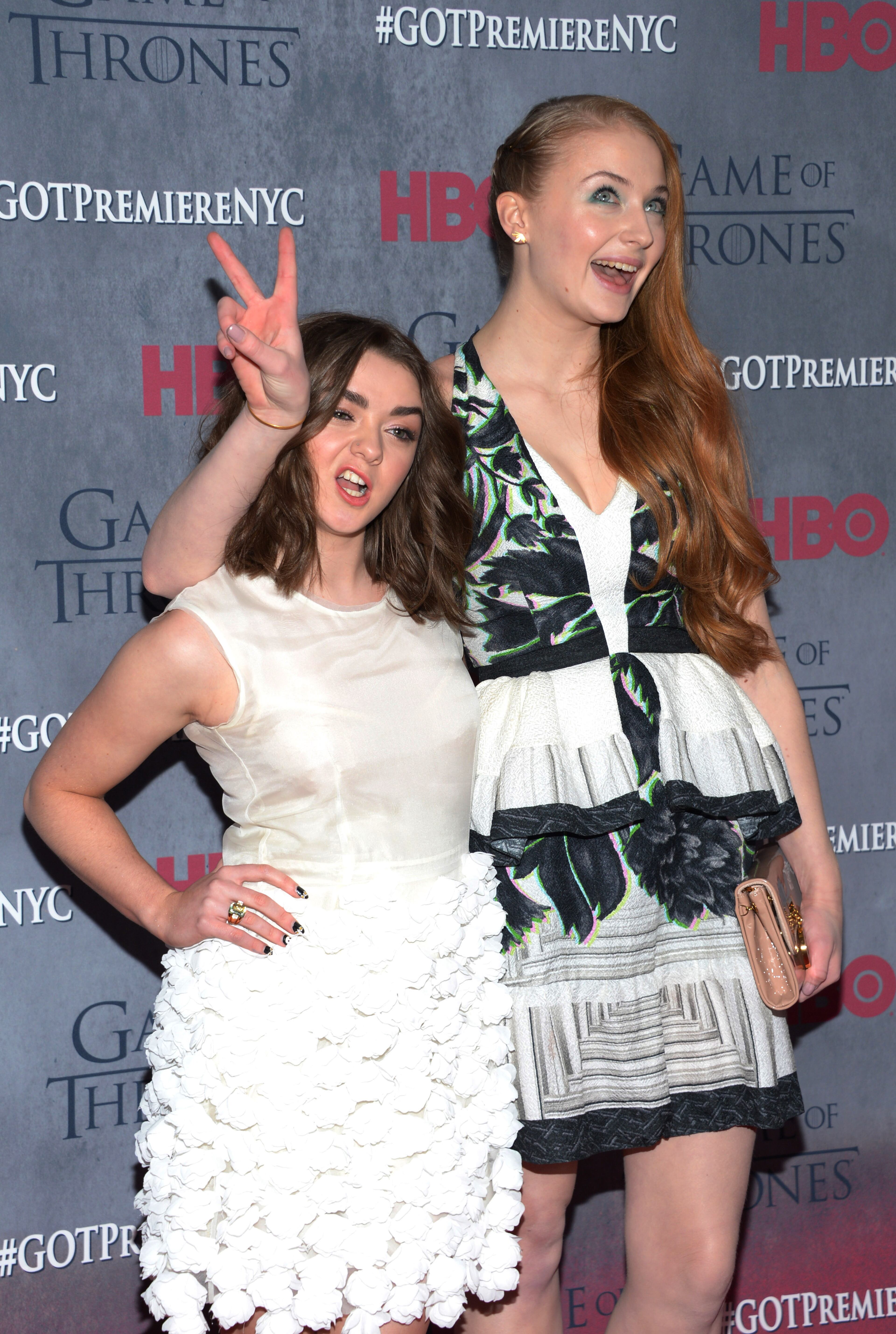 Maisie Williams and Sophie Turner arrive at New York Premiere of "Game of Thrones" Fourth Season on Tuesday, March 18, 2014, in New York. (Photo by Evan Agostini/Invision/AP)