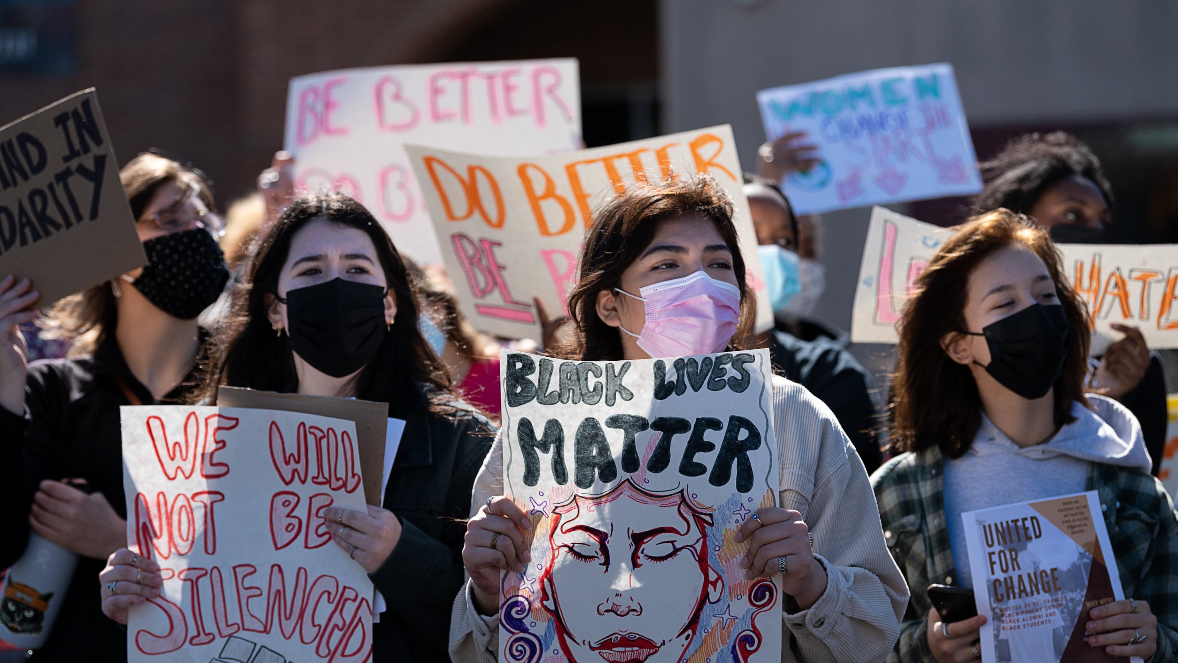 St. Francis High School students show support for Black students during a United for Change rally Wednesday, Feb. 24, 2021, after a student was disciplined for allegedly using a Snapchat feature to imitate Blackface and mock a Black peer. (Paul Kitagaki Jr./The Sacramento Bee)