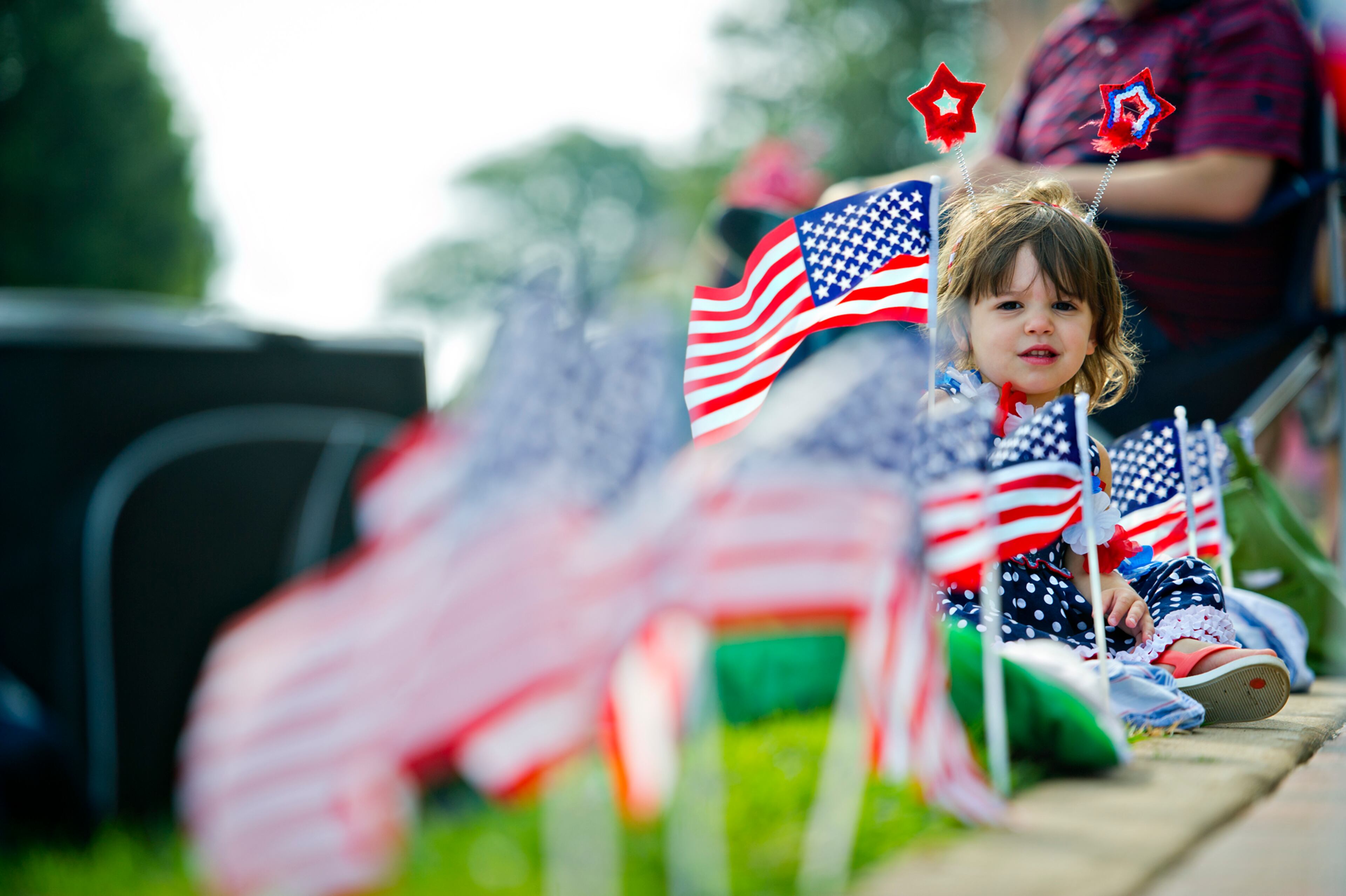 July 4, 2014 Marietta - Cora Pearson waits for the start of the Marietta Freedom Parade on Friday, July 4, 2014. The parade was part of Marietta's Fourth in the Park celebration which included free live concerts, museum tours, an arts and crafts show, food, carnival games and a fireworks finale. The Marietta Freedom Parade included 110 entries, 2,000 participants and an estimated 30,000 spectators. JONATHAN PHILLIPS / SPECIAL