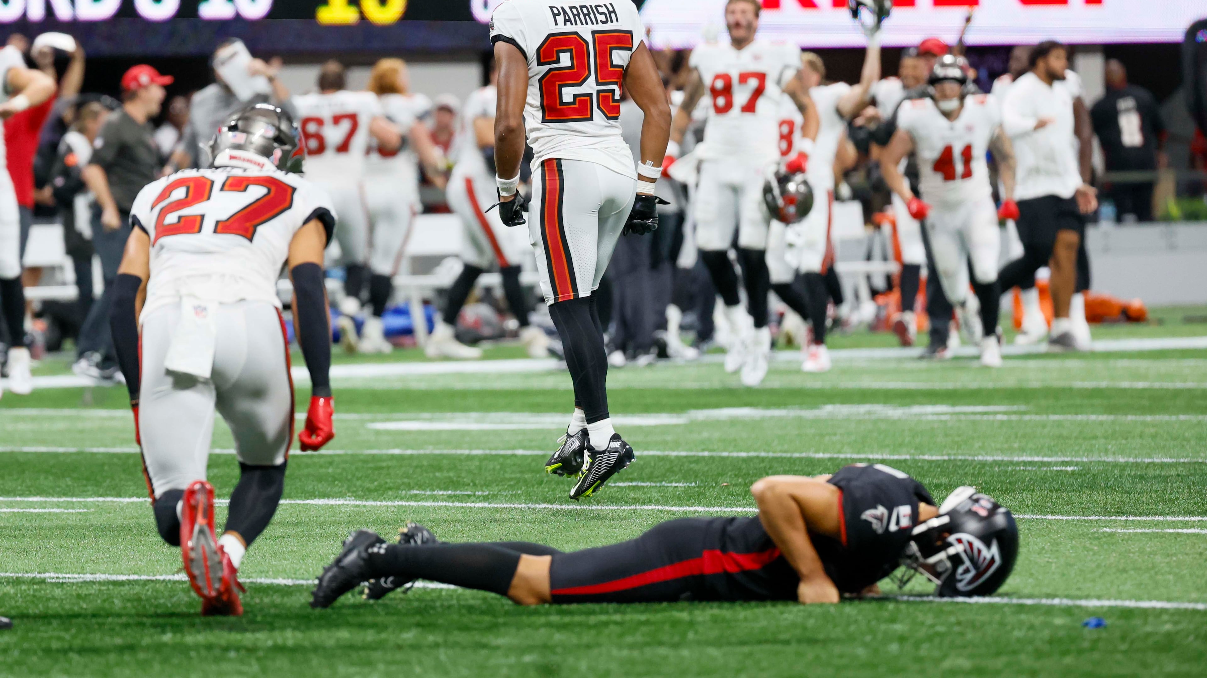 Tampa Bay Buccaneers players celebrate as Atlanta Falcons placekicker Younghoe Koo (6) lies on the ground after missing a last-second field goal. The Atlanta Falcons lost their home opener 23-20 to the Tampa Bay Buccaneers at Mercedes-Benz Stadium on Sunday, September 7, 2025, in Atlanta.
(Miguel Martinez/ AJC)
