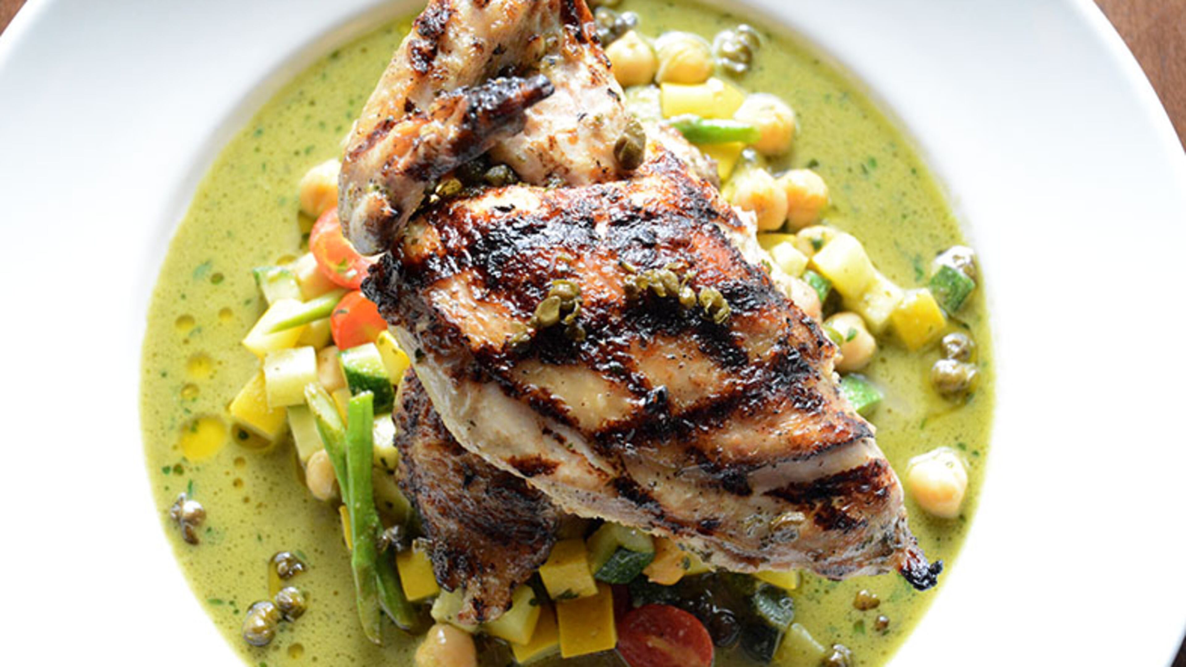 Crispy Brick Chicken with Garlic-Kale Pesto at Marlow's Tavern. Styling by Ben Krawiecki / Contributed by Adrienne Harris