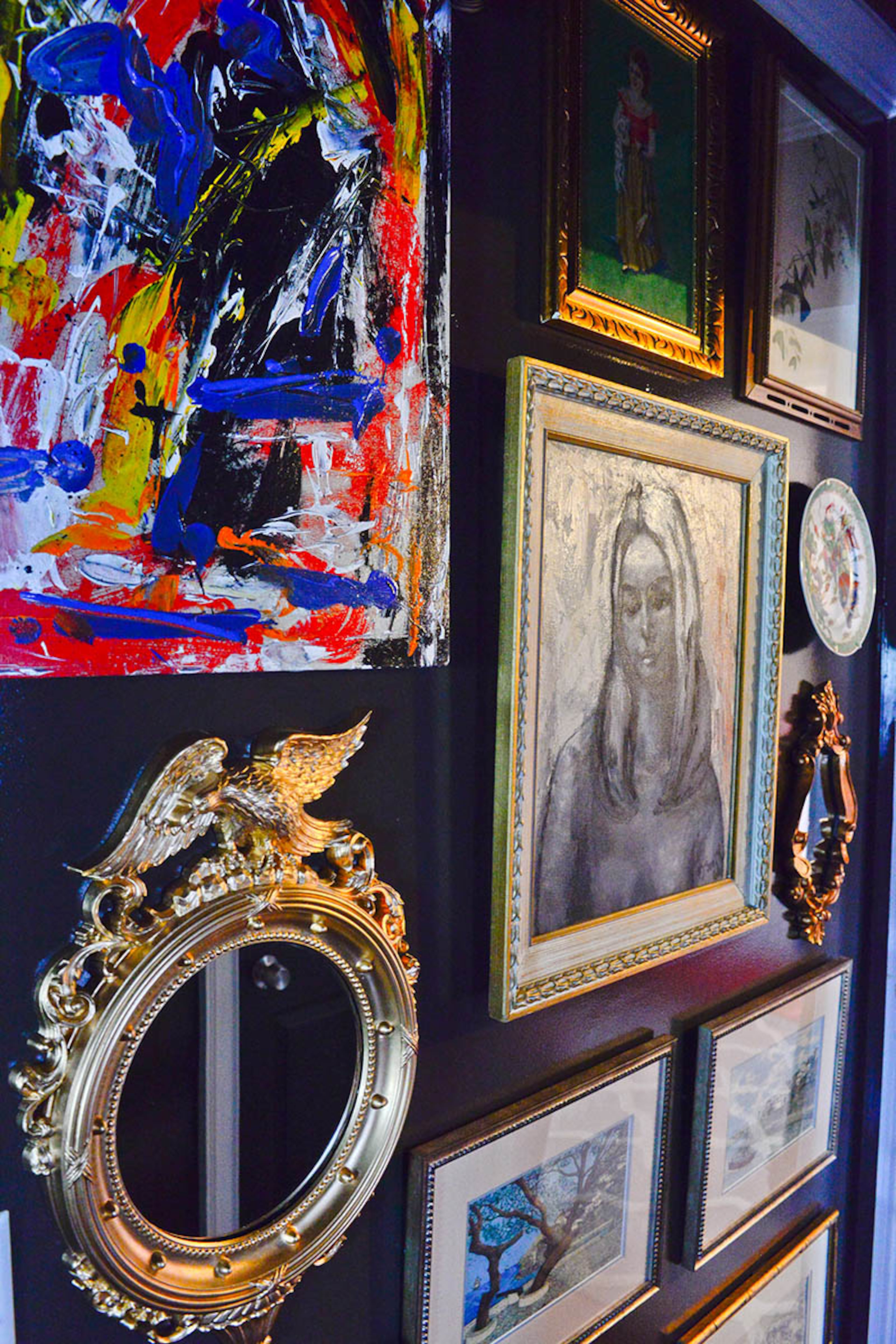Katie Luepke finds a lot of her favorite art pieces at flea markets and estate sales, blending unrelated pieces to make an eclectic but somehow cohesive look.