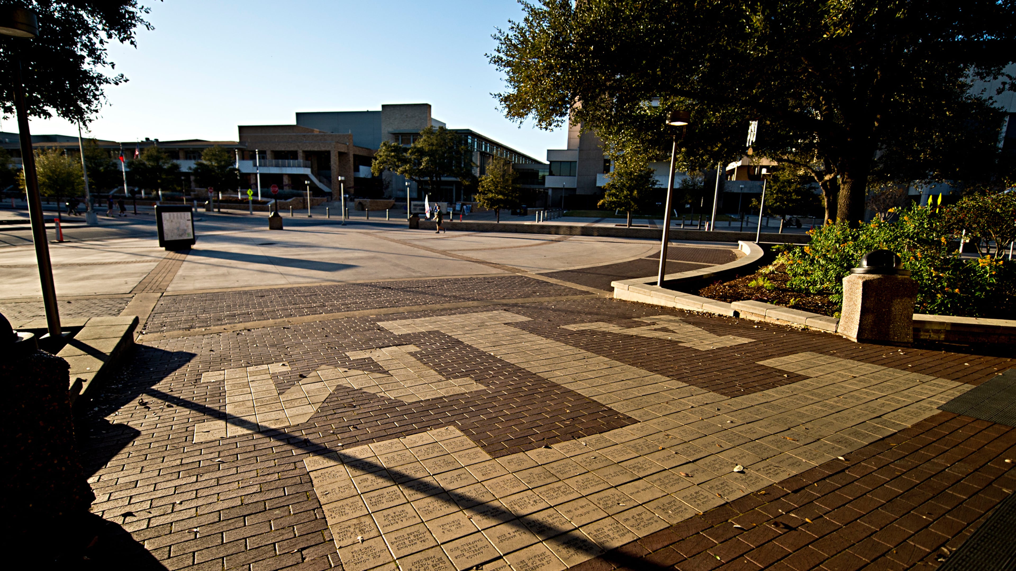 FILE - The sun sets over Texas A&M Campus, just outside Rudder Tower, Feb 12, 2016, in College Station, Texas. (Timothy Hurst/College Station Eagle via AP, File)