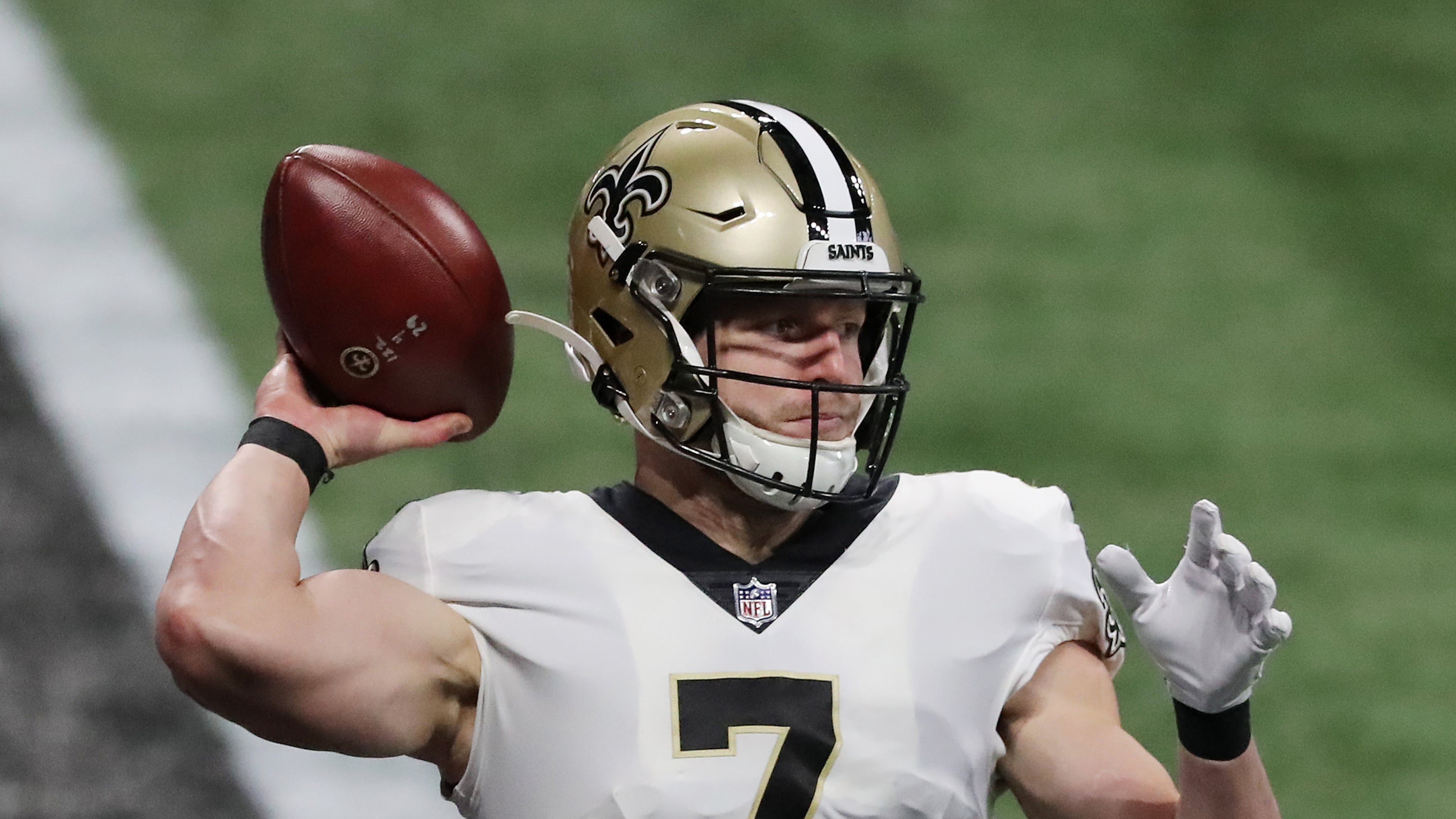 New Orleans Saints quarterback Taysom Hill completes a pass against the Atlanta Falcons during the first quarter on Sunday, Dec. 6, 2020, in Atlanta, Georgia.
Curtis Compton / Atlanta Journal-Constitution/TNS