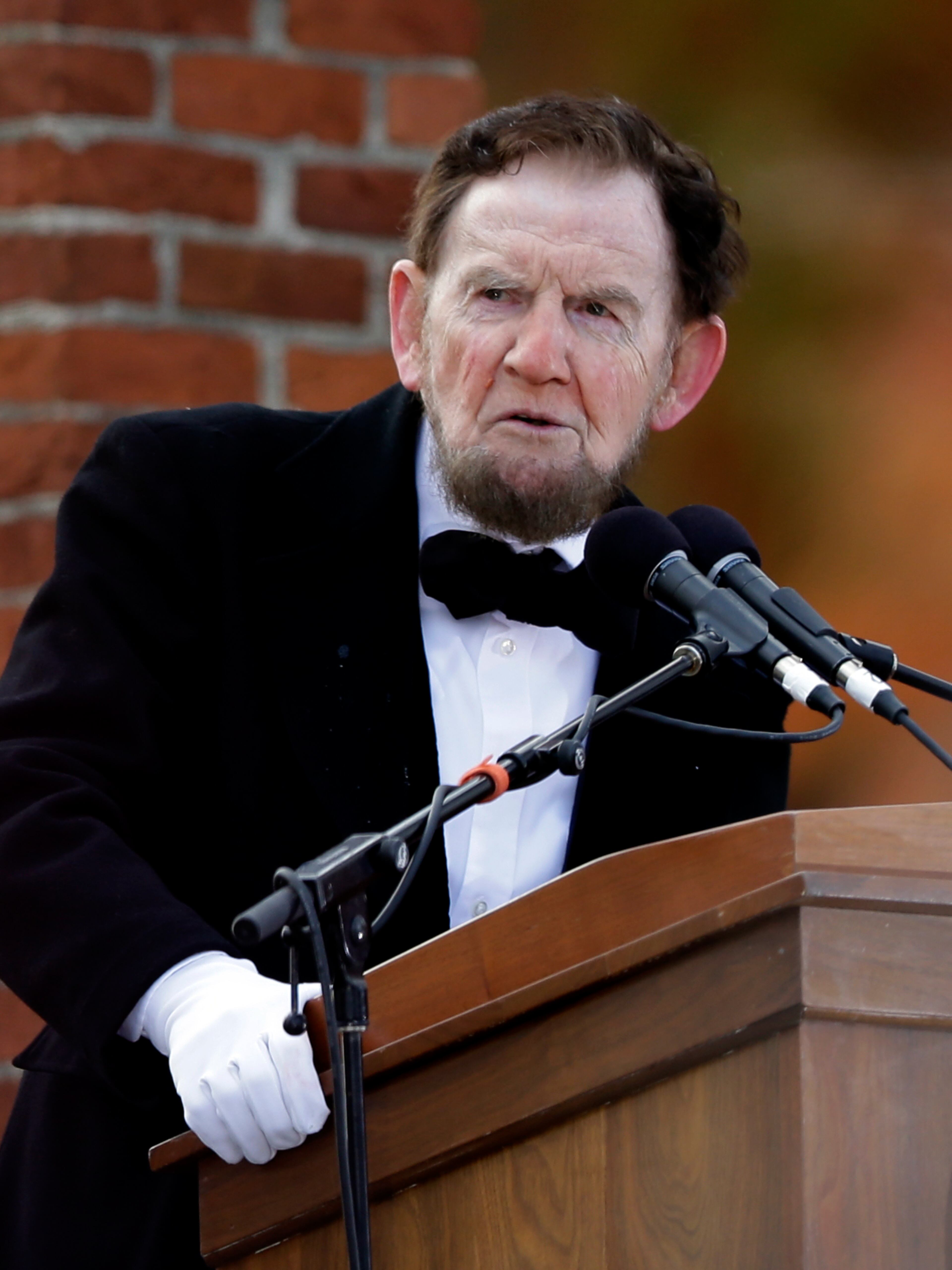 James Getty, portraying President Abraham Lincoln, recites the Gettysburg Address during a ceremony commemorating the 150th anniversary of the dedication of the Soldiers' National Cemetery and the historic speech, Tuesday Nov. 19, 2013, in Gettysburg, Pa. Lincoln's speech was first delivered in Gettysburg nearly five months after the major battle that left tens of thousands of men wounded, dead or missing. (AP Photo/Matt Rourke)