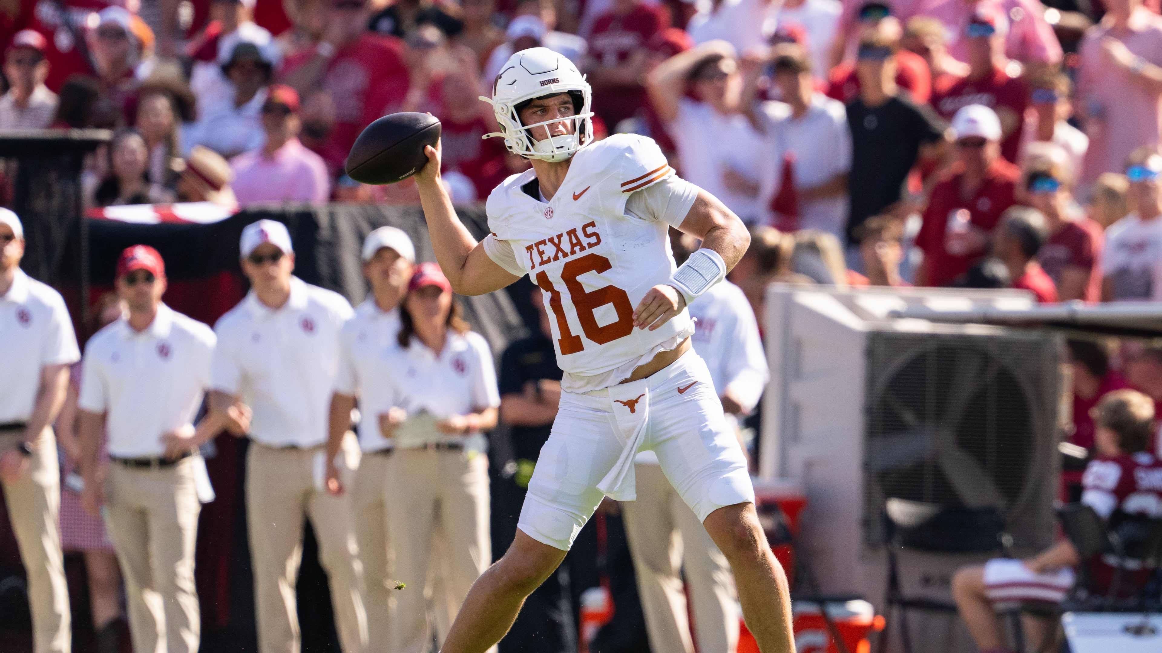 Texas quarterback Arch Manning throws a touchdown pass against Oklahoma on Saturday, Oct. 10, 2026, in Dallas. Manning was 19-of-31 for 260 yards, three touchdowns and two interceptions, but the Sooners beat the top-ranked Longhorns 27-24. (Jeffrey McWhorter/AP)