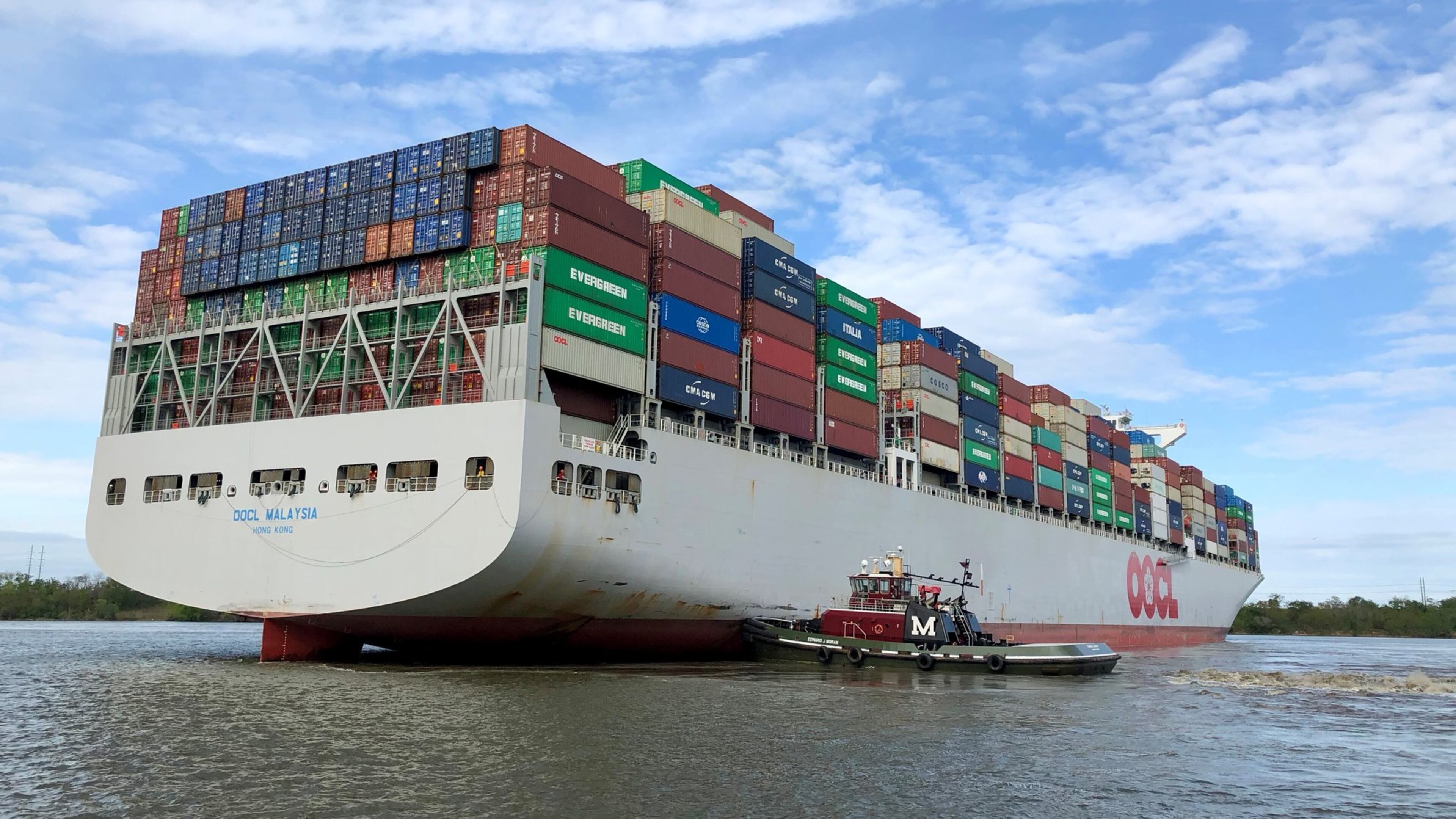 A river pilot craft guides the OOCL Malaysia freighter to a bearth at the Port of Savannah on Monday, March 26, 2018. J. Scott Trubey/strubey@ajc.com
