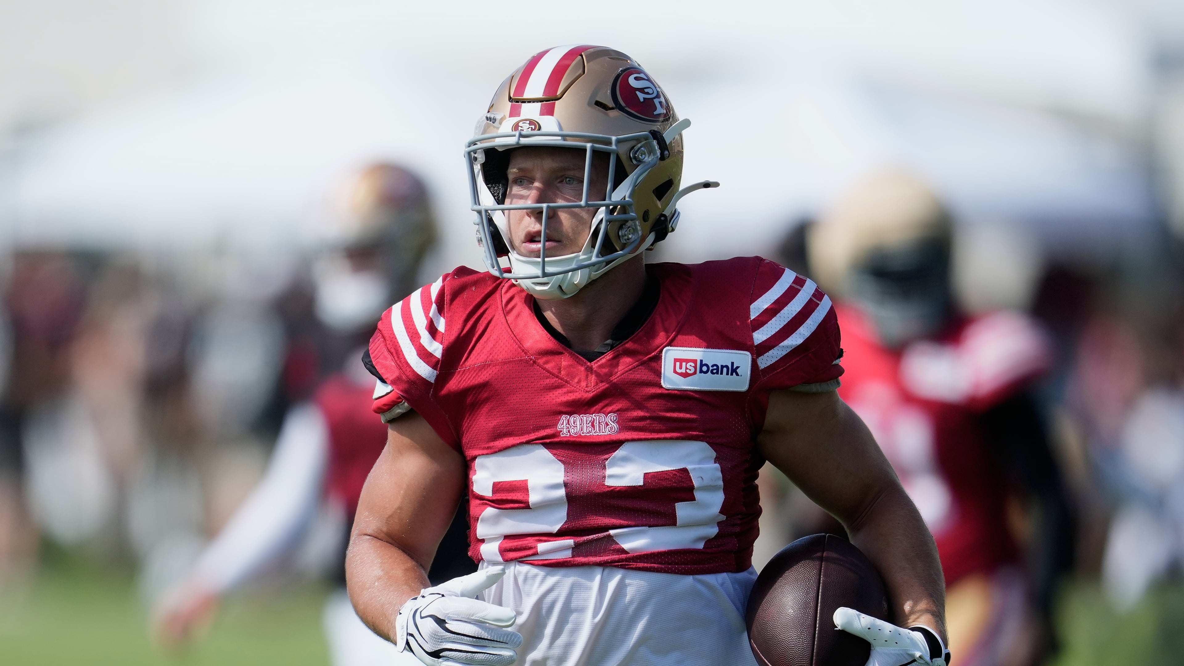 San Francisco 49ers running back Christian McCaffrey (23) runs during the NFL football team's training camp, Thursday, Aug. 6, 2026, in Santa Clara, Calif. (AP Photo/Jeff Chiu)