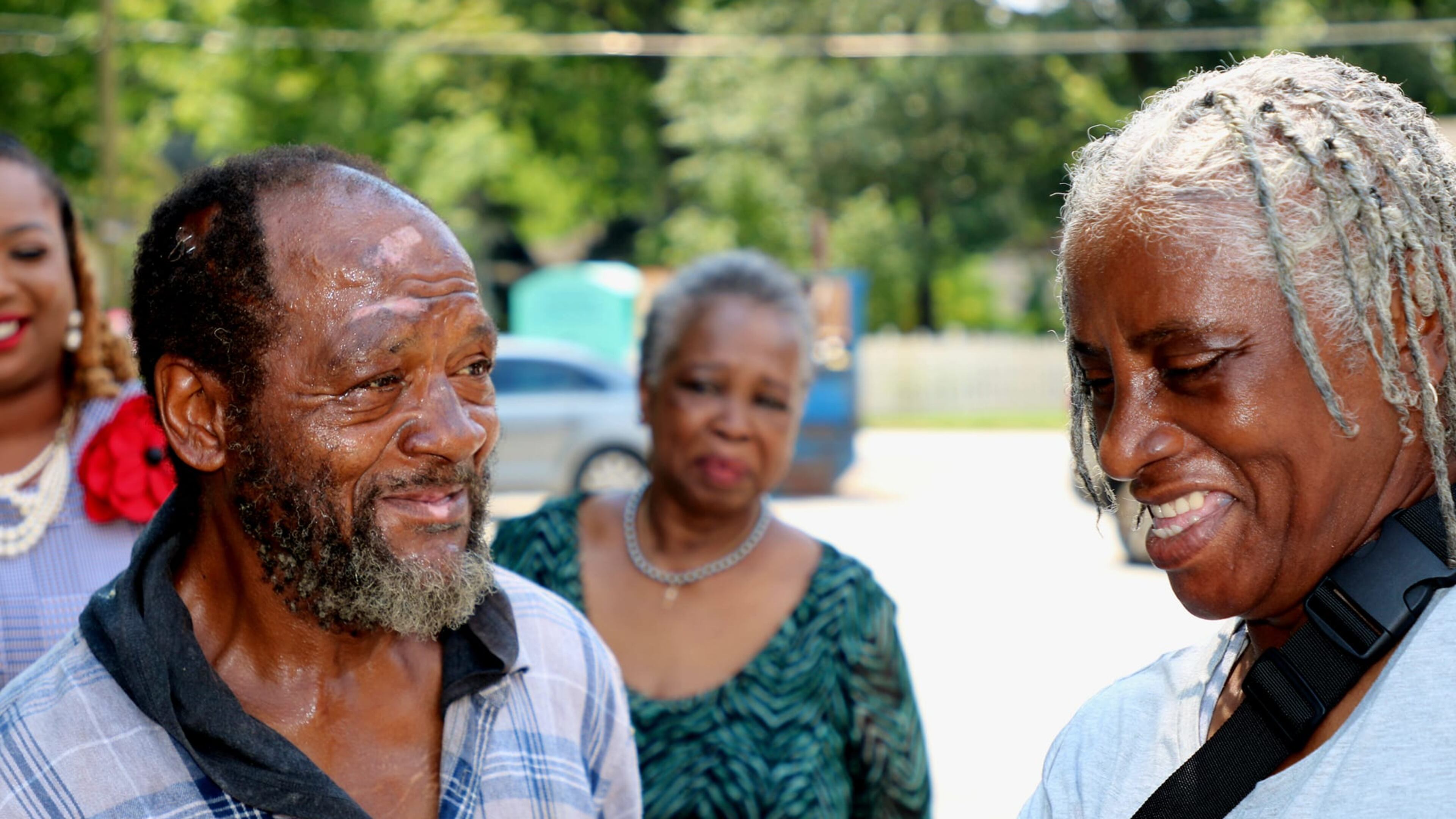 Emanuel Biggs stands with Denia Dixon (r.) and church members at First Iconium Baptist Church. (Photo courtesy of Charlotte Jackson-Johnson)