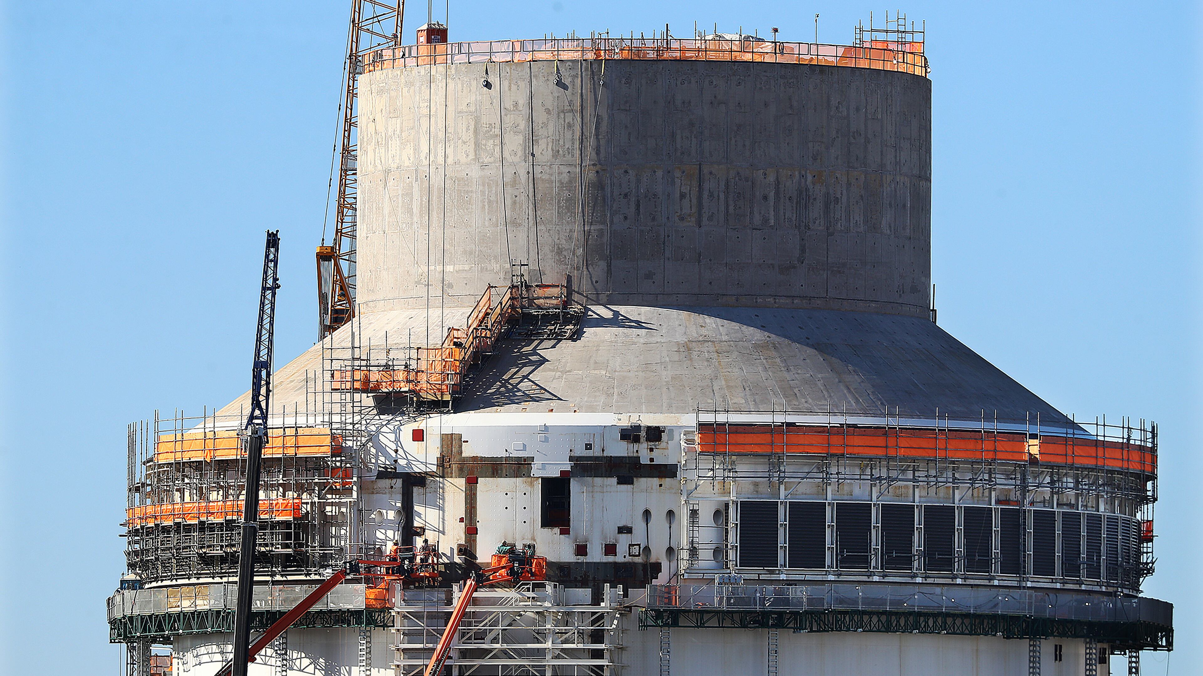 Construction is seen on the exterior of Unit 4 at Plant Vogtle on Tuesday, Dec 14, 2021, in Waynesboro. “Curtis Compton / Curtis.Compton@ajc.com”`