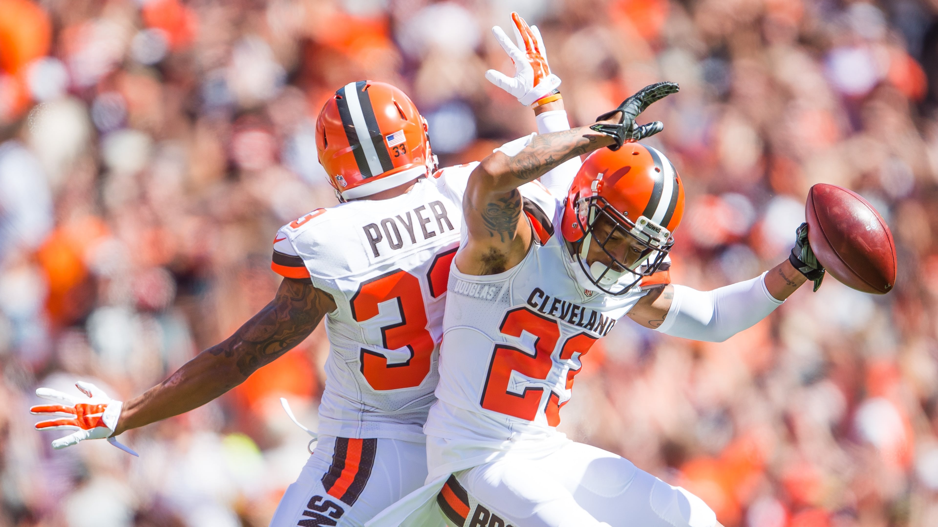 CLEVELAND, OH - SEPTEMBER 20: Cornerback Jordan Poyer #33 and cornerback Joe Haden #23 of the Cleveland Browns celebrate after a fumble recovery during the first quarter at FirstEnergy Stadium on September 20, 2015 in Cleveland, Ohio. (Photo by Jason Miller/Getty Images)