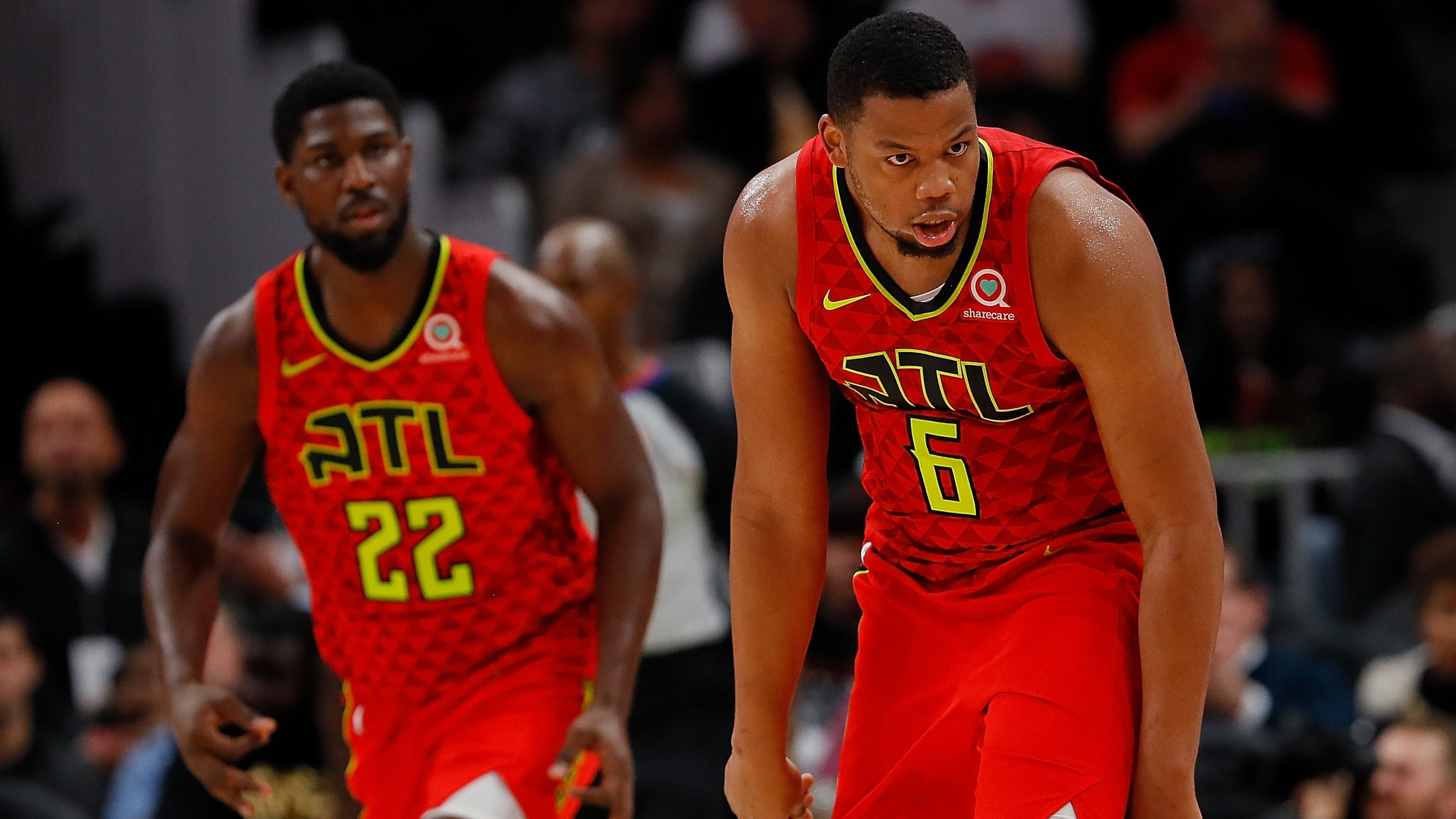 Omari Spellman of the Atlanta Hawks reacts after hitting a 3-point basket against the New York Knicks at State Farm Arena on November 7, 2018 in Atlanta, Georgia.