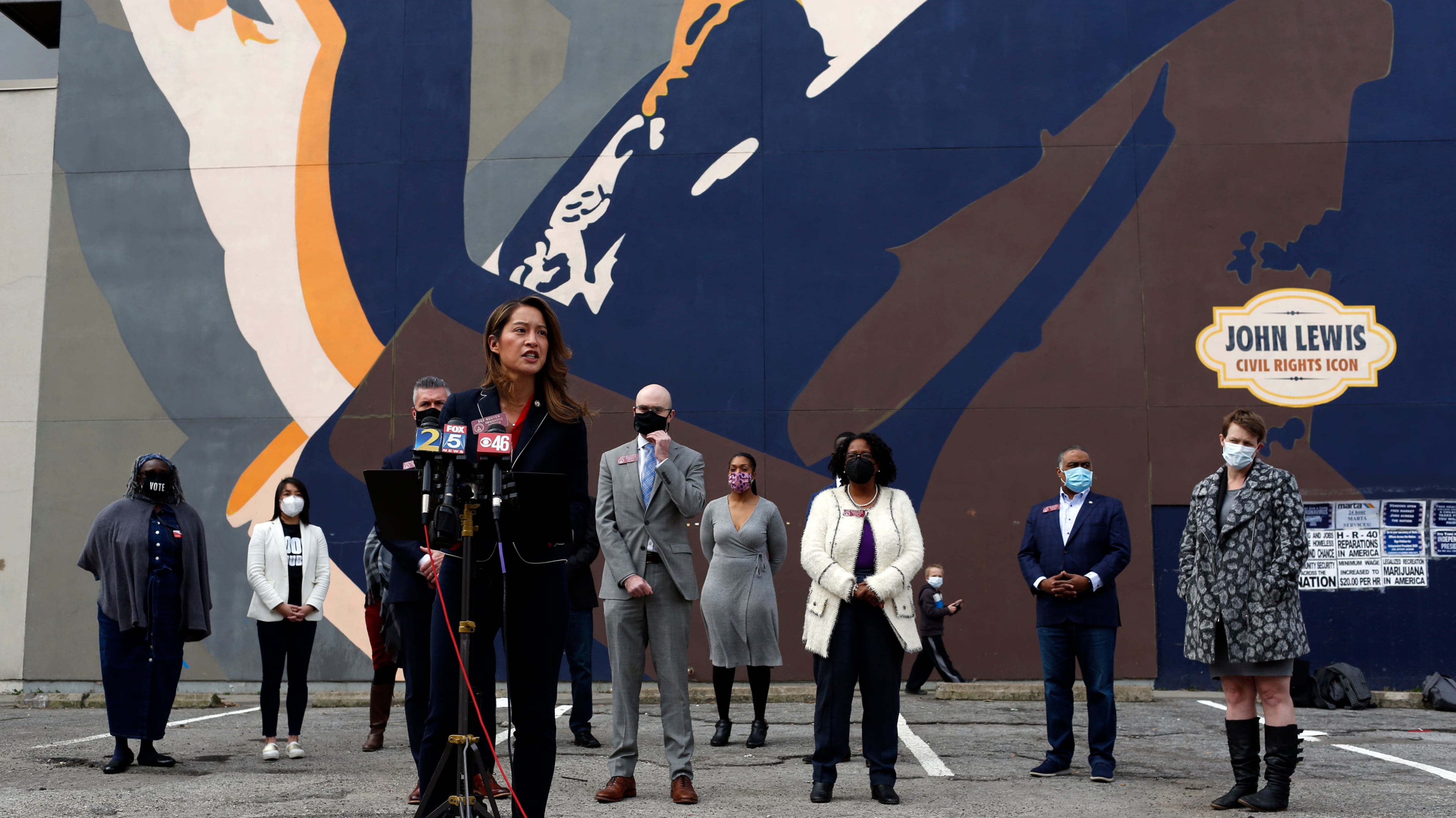 State Rep. Bee Nguyen, D-Atlanta, speaks Tuesday at a press conference at the John Lewis mural on Auburn Avenue in downtown Atlanta. Democratic lawmakers announced the introduction of two bills that would restore the right to vote to felons in Georgia. (Rebecca Wright for the Atlanta Journal-Constitution)