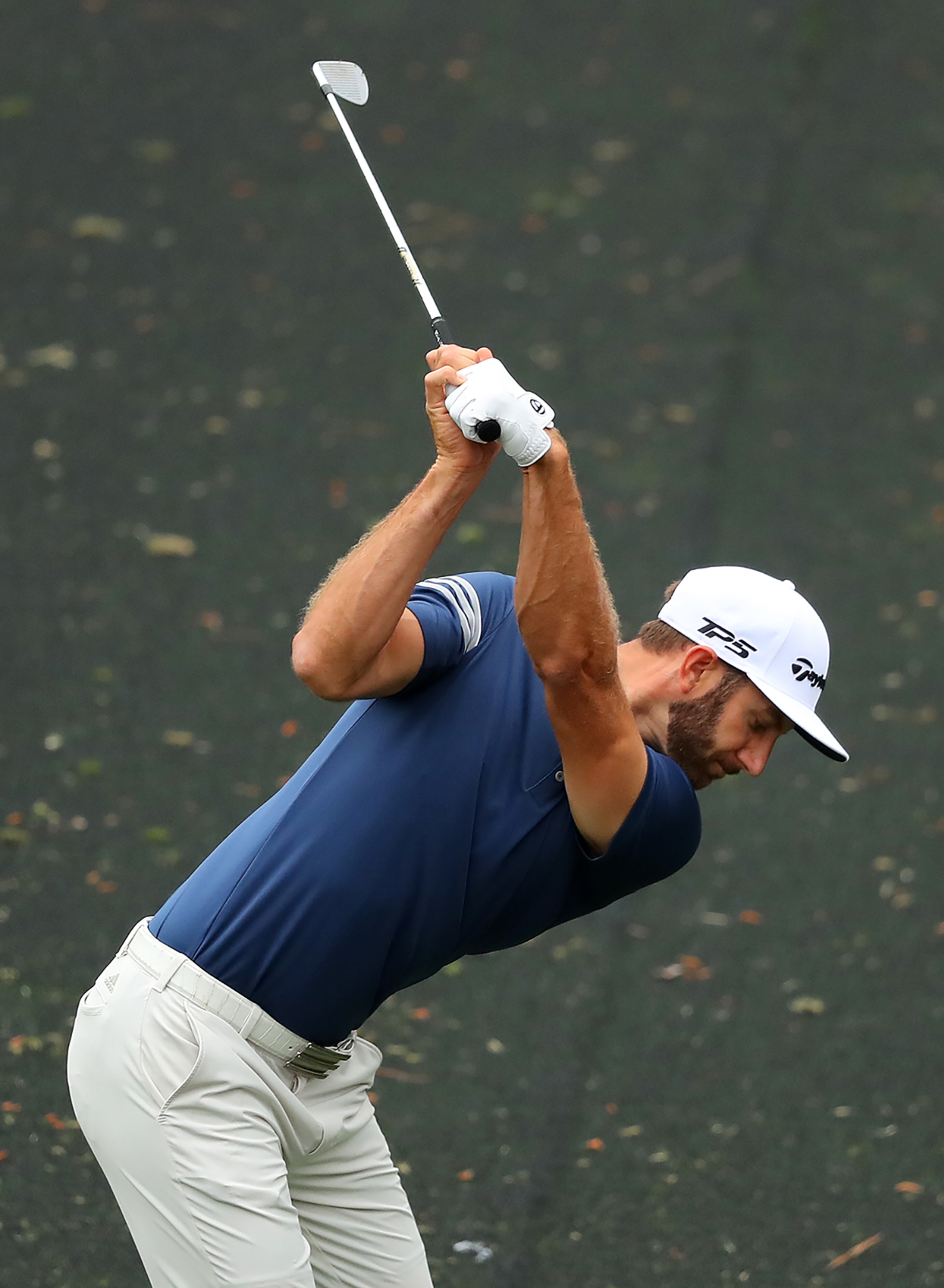 April 3, 2017, Augusta: Dustin Johnson tees off on the 12th hole during his practice round for the Masters at Augusta National Golf Club on Monday, April 3, 2017, in Augusta. Curtis Compton/ccompton@ajc.com
