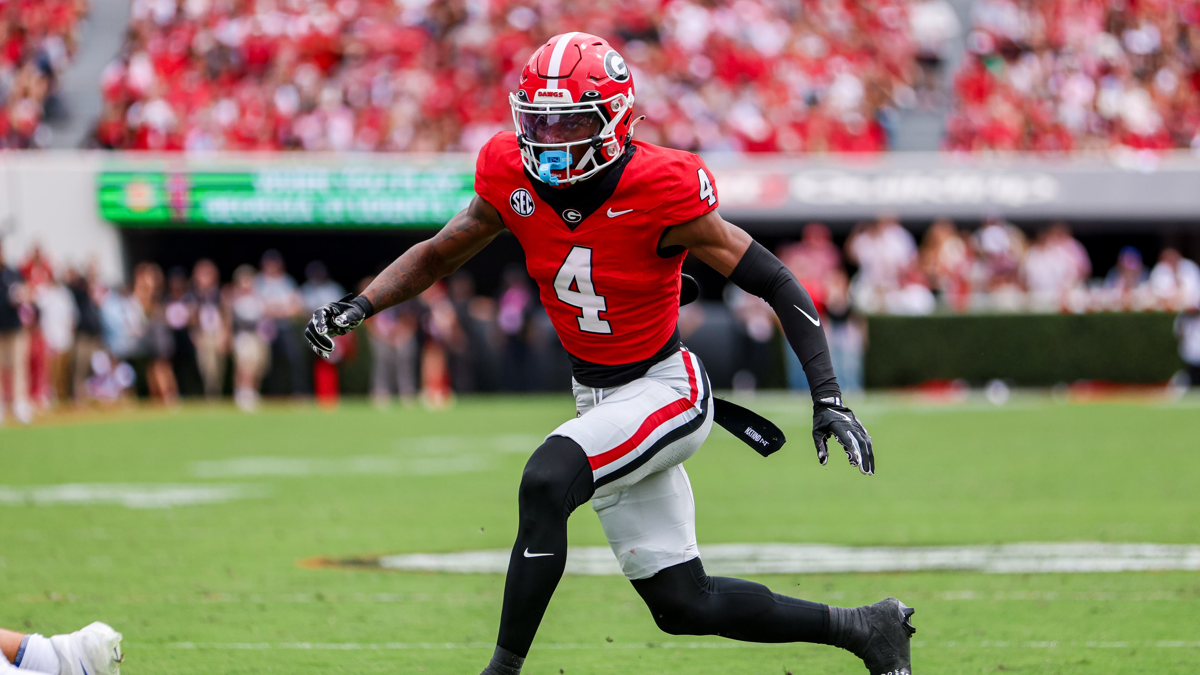 Georgia defensive back KJ Bolden, shown running against Kentucky at Sanford Stadium, will be coveted for his athleticism, ability to play center field and his pedigree coming from coach Kirby Smart’s program. (Conor Dillon/UGAAA 2025)