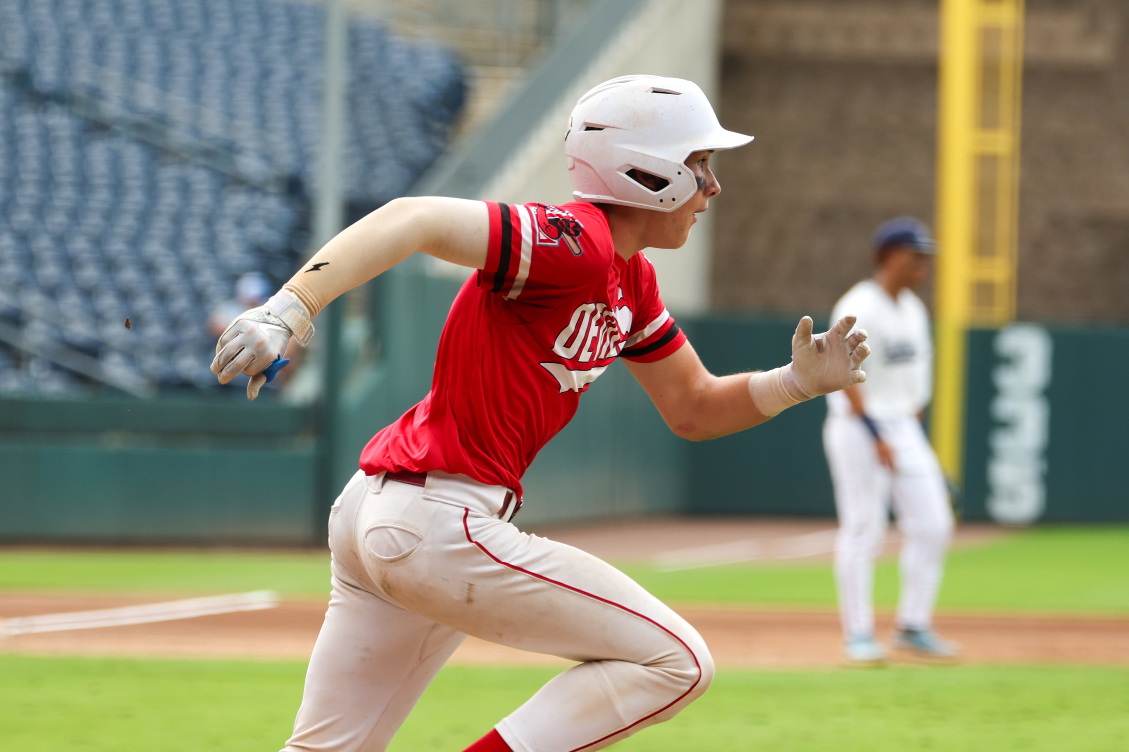 Loganville’s Dawson Allen hits an RBI during the fourth inning in Game 2 of their GHSA Class 5A baseball championship series against Pope at Gwinnett Field on Tuesday, May 26, 2026, in Lawrenceville. (Arvin Temkar/AJC)