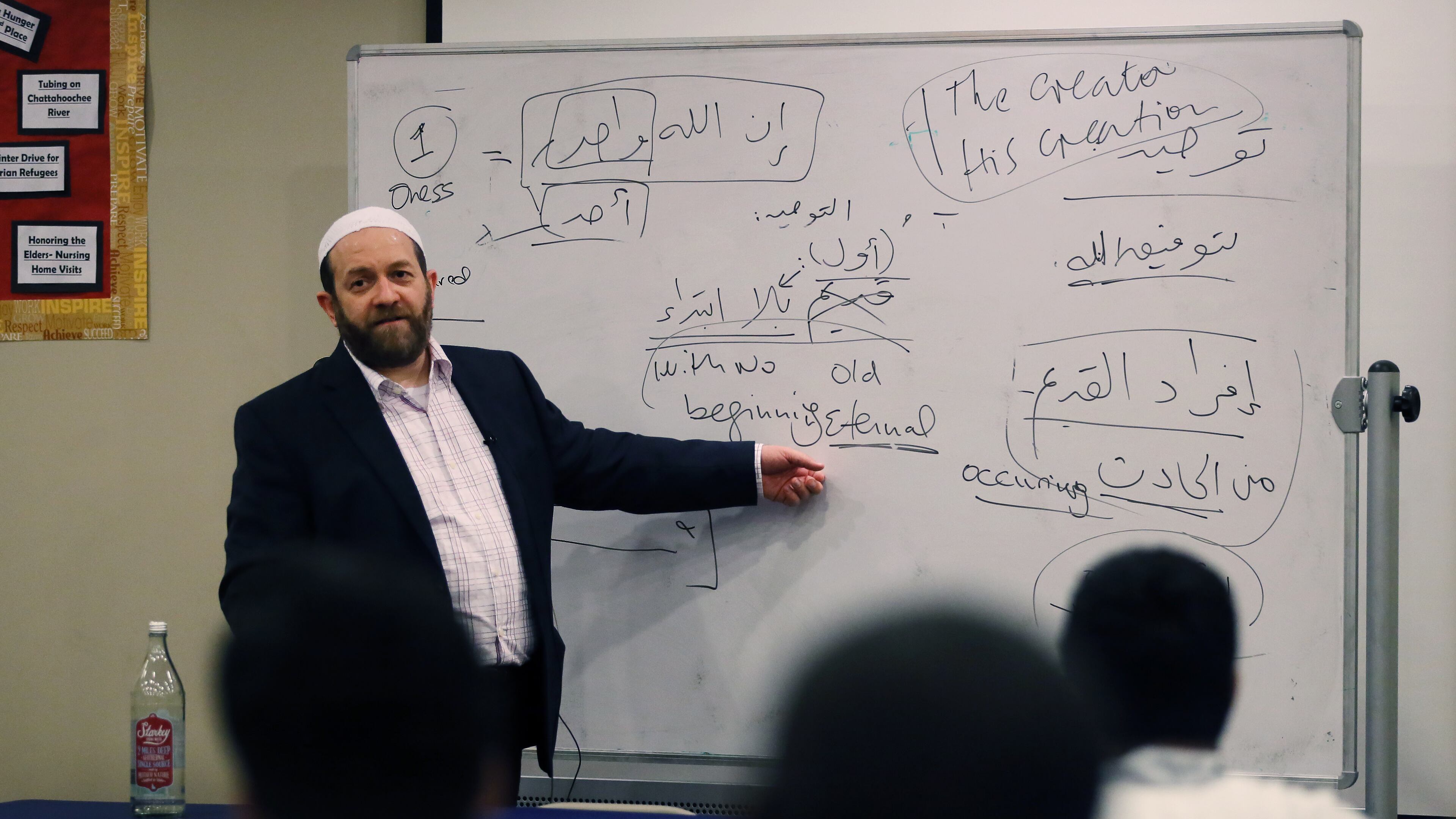 Muhammad Ninowy teaches a class in the “Islamic Creed”, or “Aqeeda”, at the Madina Institute in Duluth. The Institute offers several seminary certificate programs for young Muslims who wish to learn more about their religion. Community leaders say having American born, American trained religious leaders is important to the community and a bulwark against potential radicalization. BOB ANDRES /BANDRES@AJC.COM