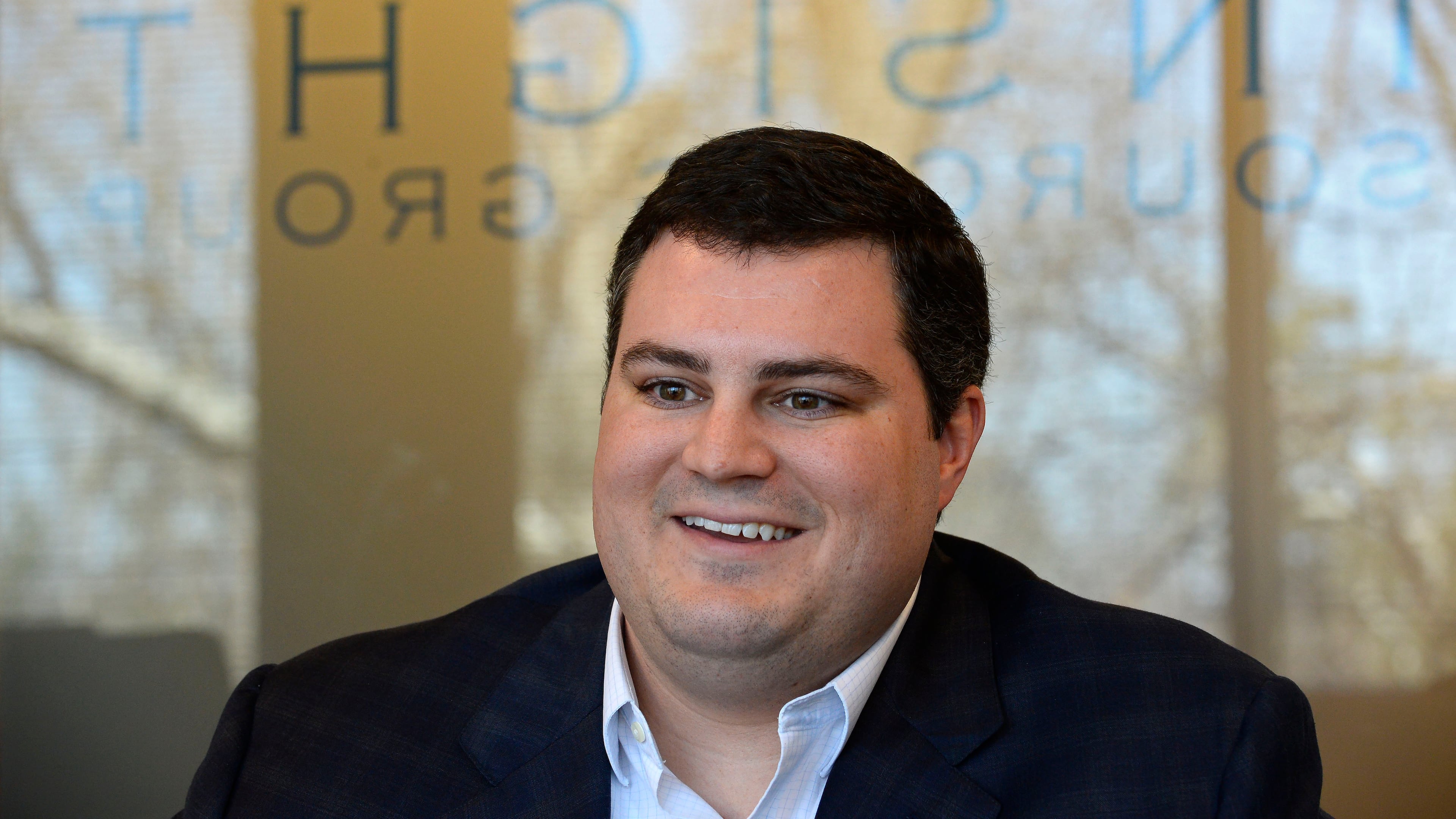 Insight Sourcing Group's KirkPoucher talks about the company's values during an interview at the firm's Norcross headquarters.