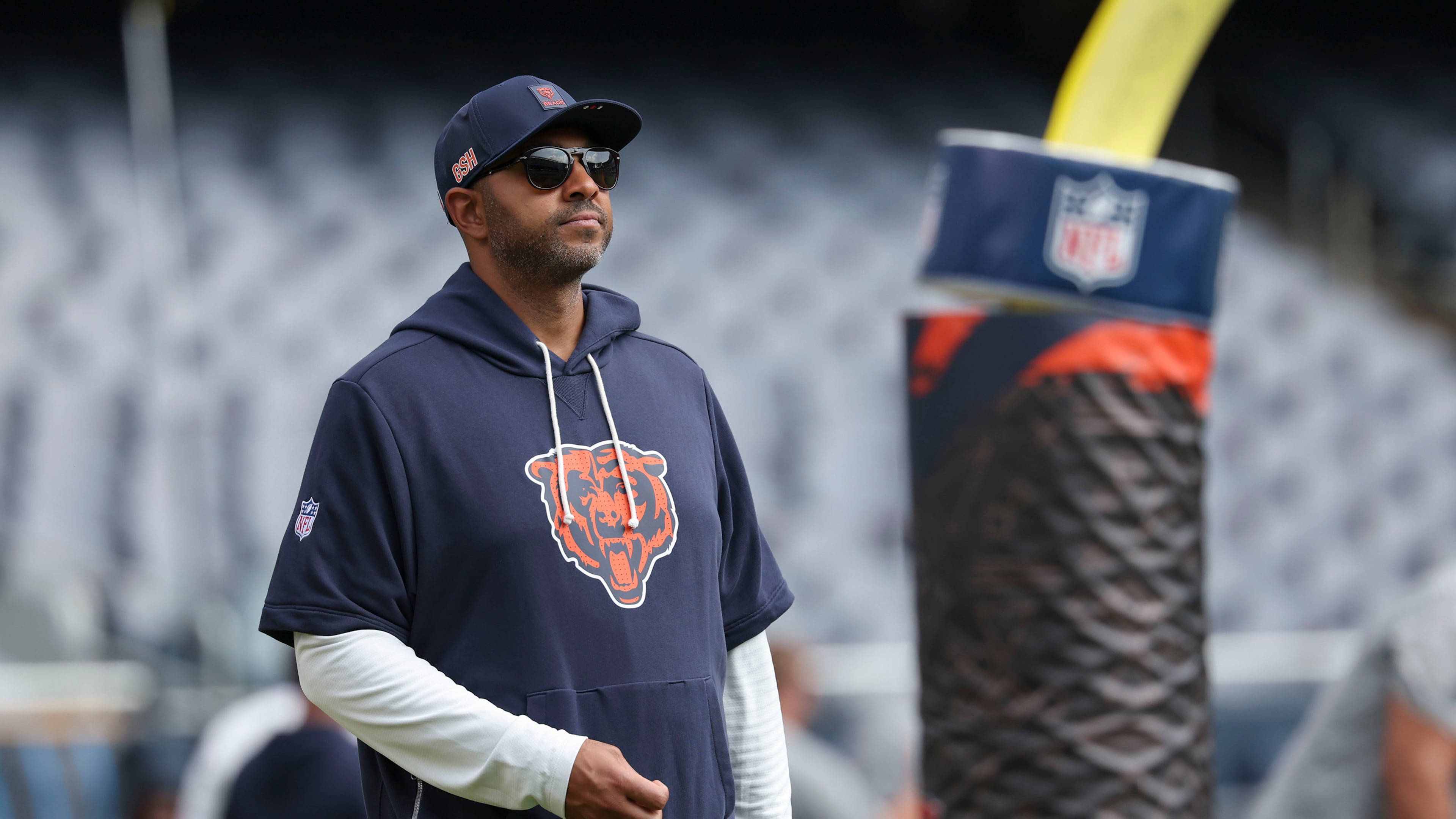 Chicago Bears assistant general manager Ian Cunningham walks on the field before a game against the Dallas Cowboys on Sept. 21, 2025, at Soldier Field in Chicago. (Brian Cassella/Chicago Tribune/Tribune News Service via Getty Images)