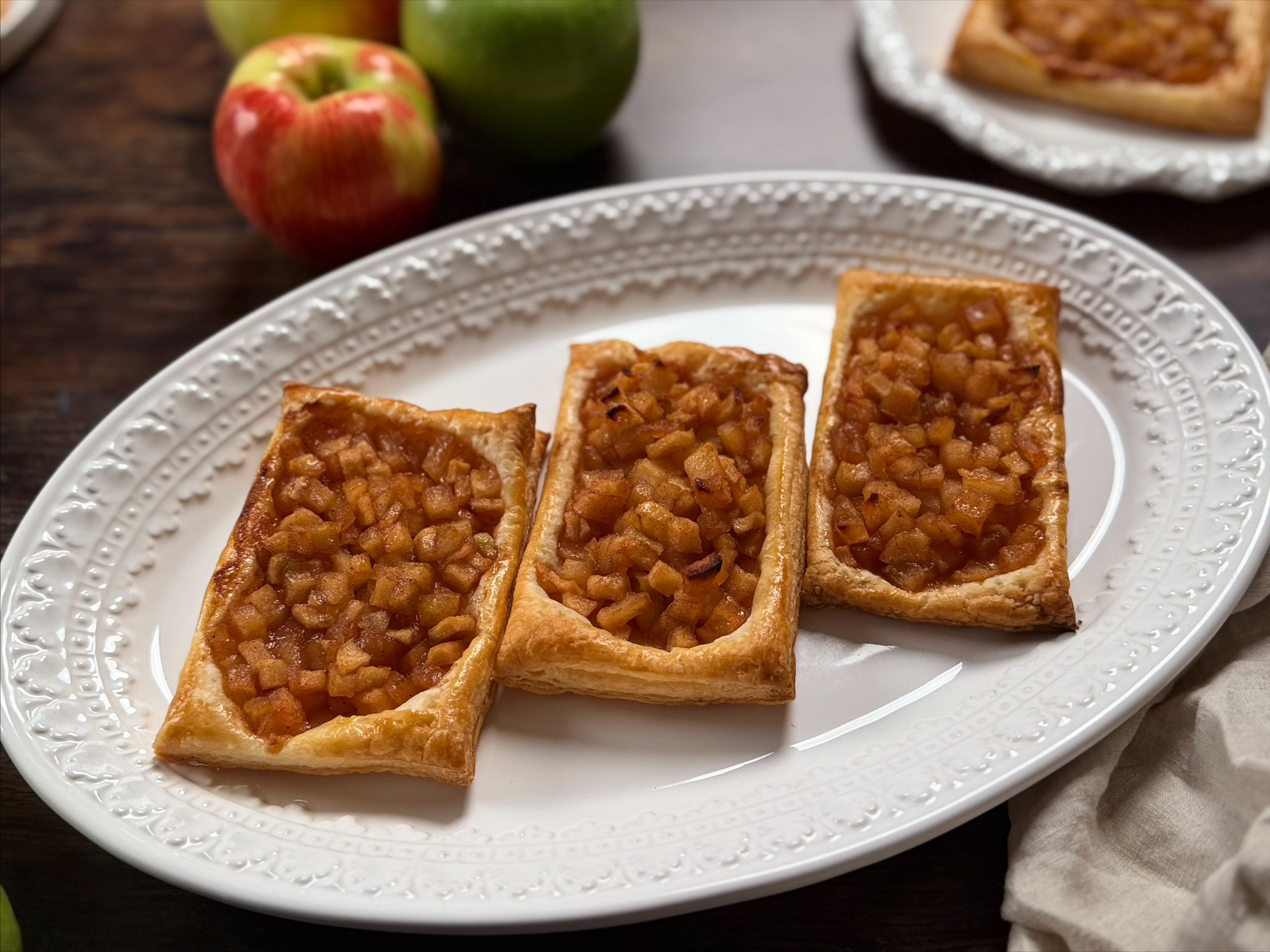 Looking for a shortcut apple pie recipe? These puff pastry apple tarts cut the prep time in half without sacrificing any of that rich, cinnamon-apple flavor. (Monti Carlo/AJC)