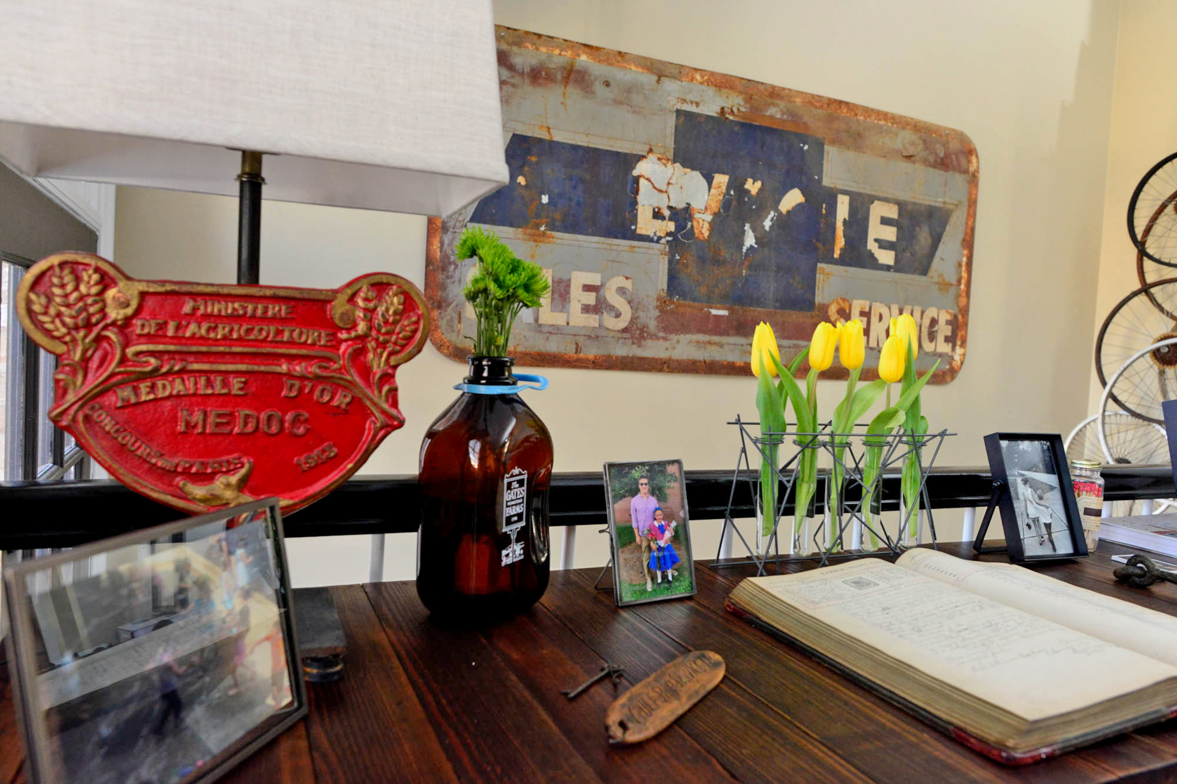 An antique ledger rests on a desk in the Marietta living room. Homeowner Brandon Hancock said it holds the minutes from 1912 to 1918 for the Independent Order of the Odd Fellows.