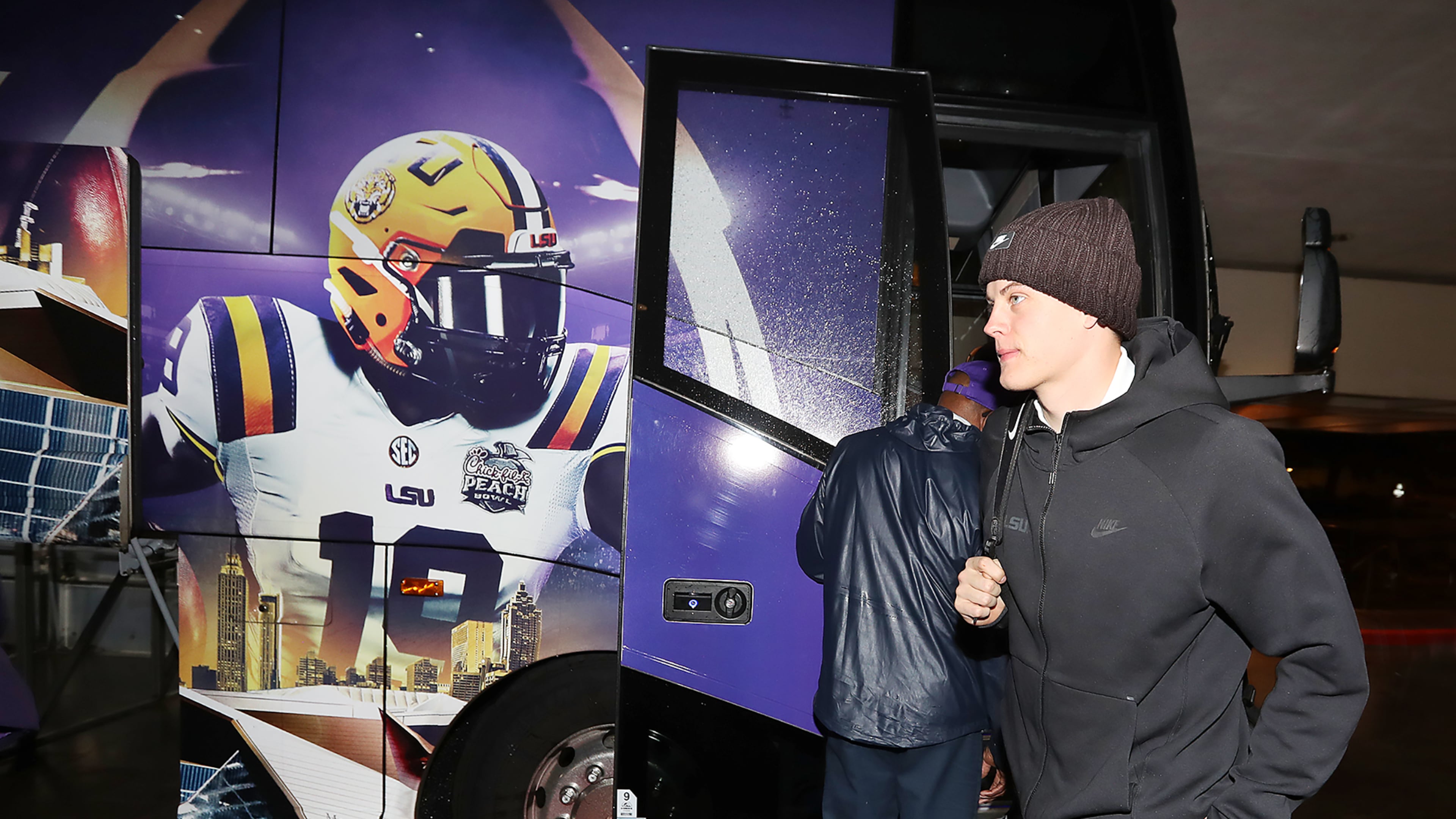 LSU quarterback Joe Burrow, the 2019 Heisman Trophy winner, arrives with his team for the CFP Chick-fil-A Peach Bowl on Sunday, Dec. 22, 2019.