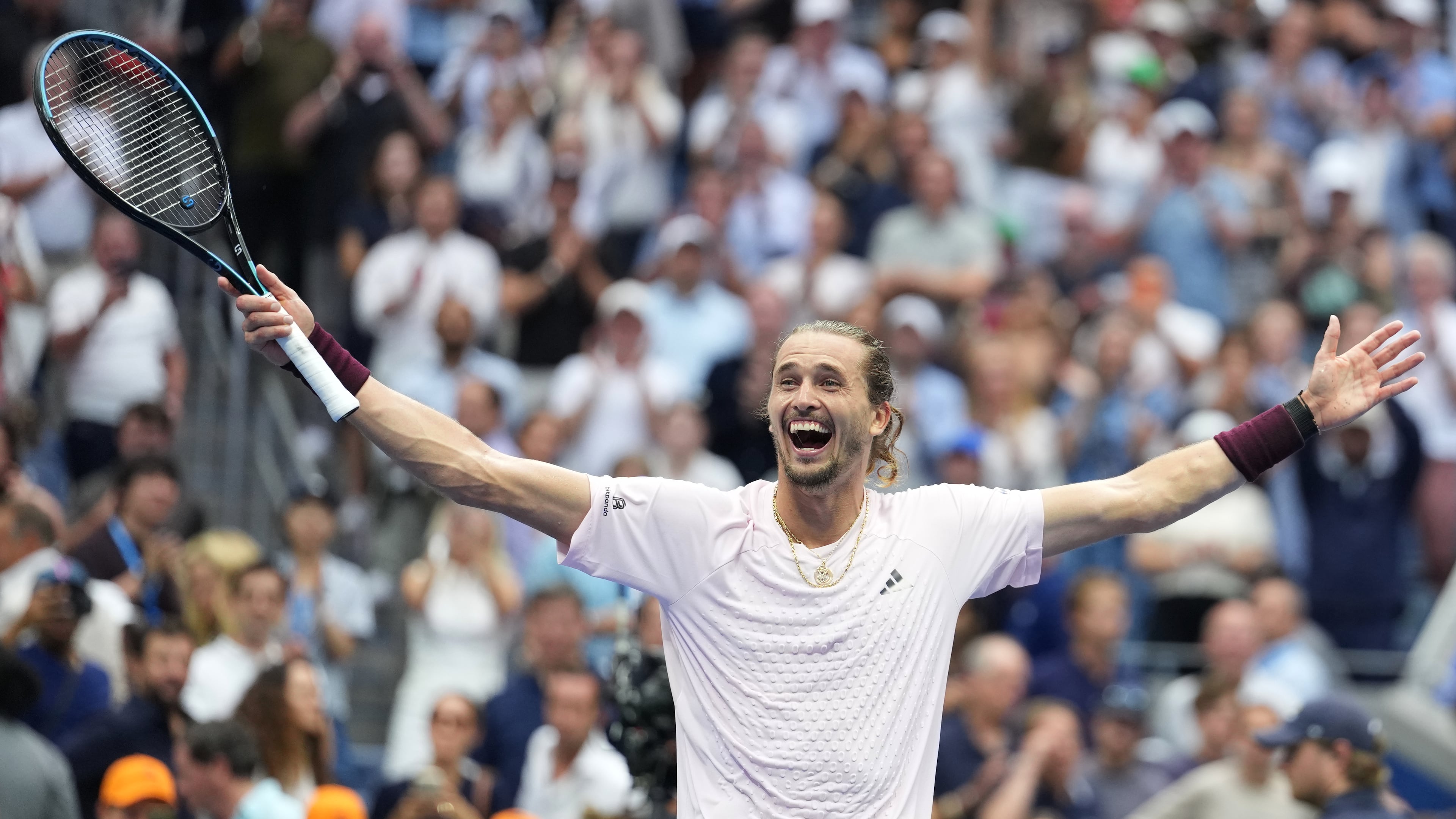 Alexander Zverev, of Germany, celebrates after he won the men's singles final of the U.S. Open tennis championships against Ben Shelton, of the United States, Sunday, Sept. 13, 2026, in New York. (AP Photo/Kirsty Wigglesworth)