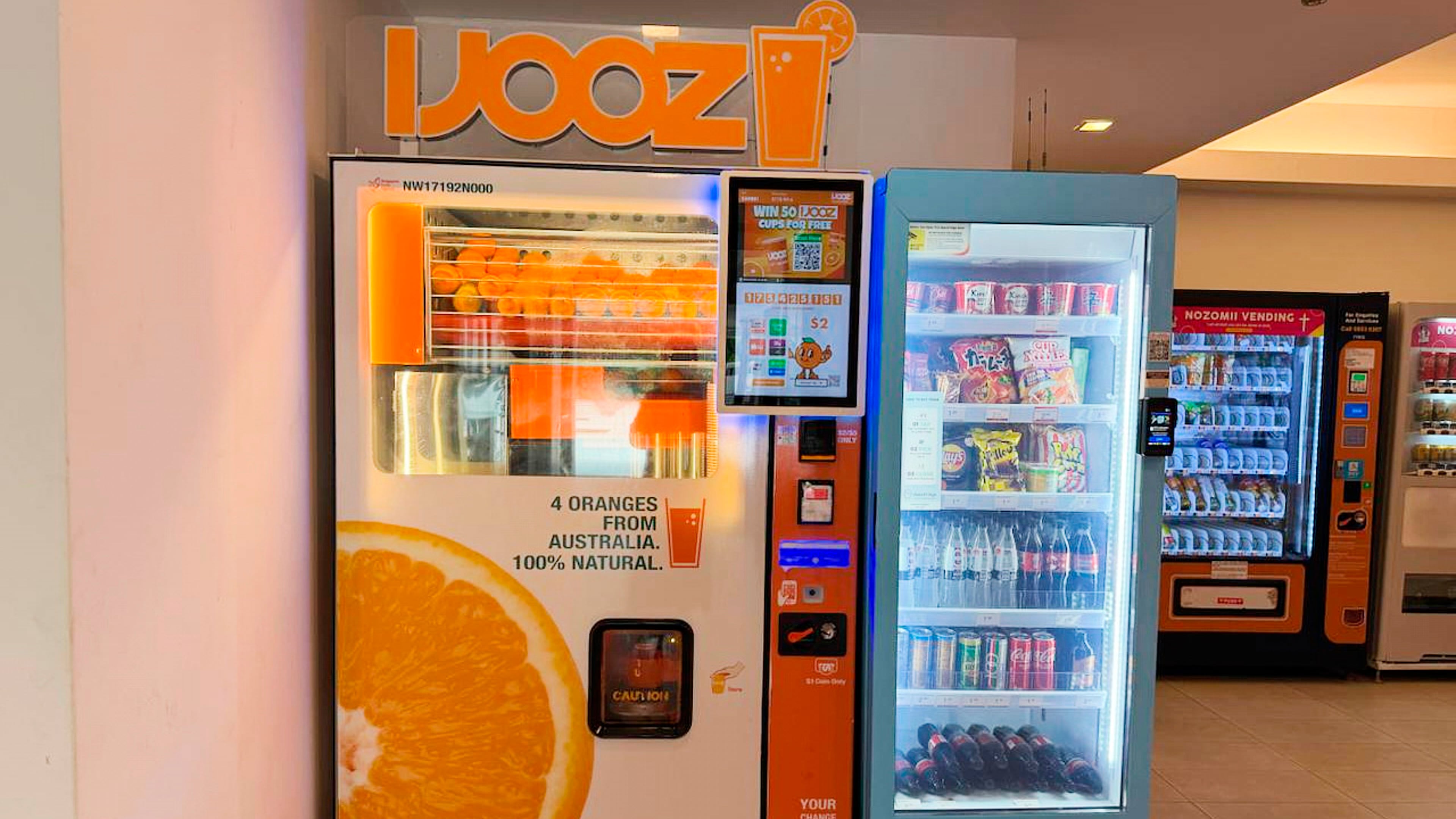 An iJooz vending machine is seen inside a building in Singapore, Thursday, April 30, 2026. (AP Photo/David Hu)