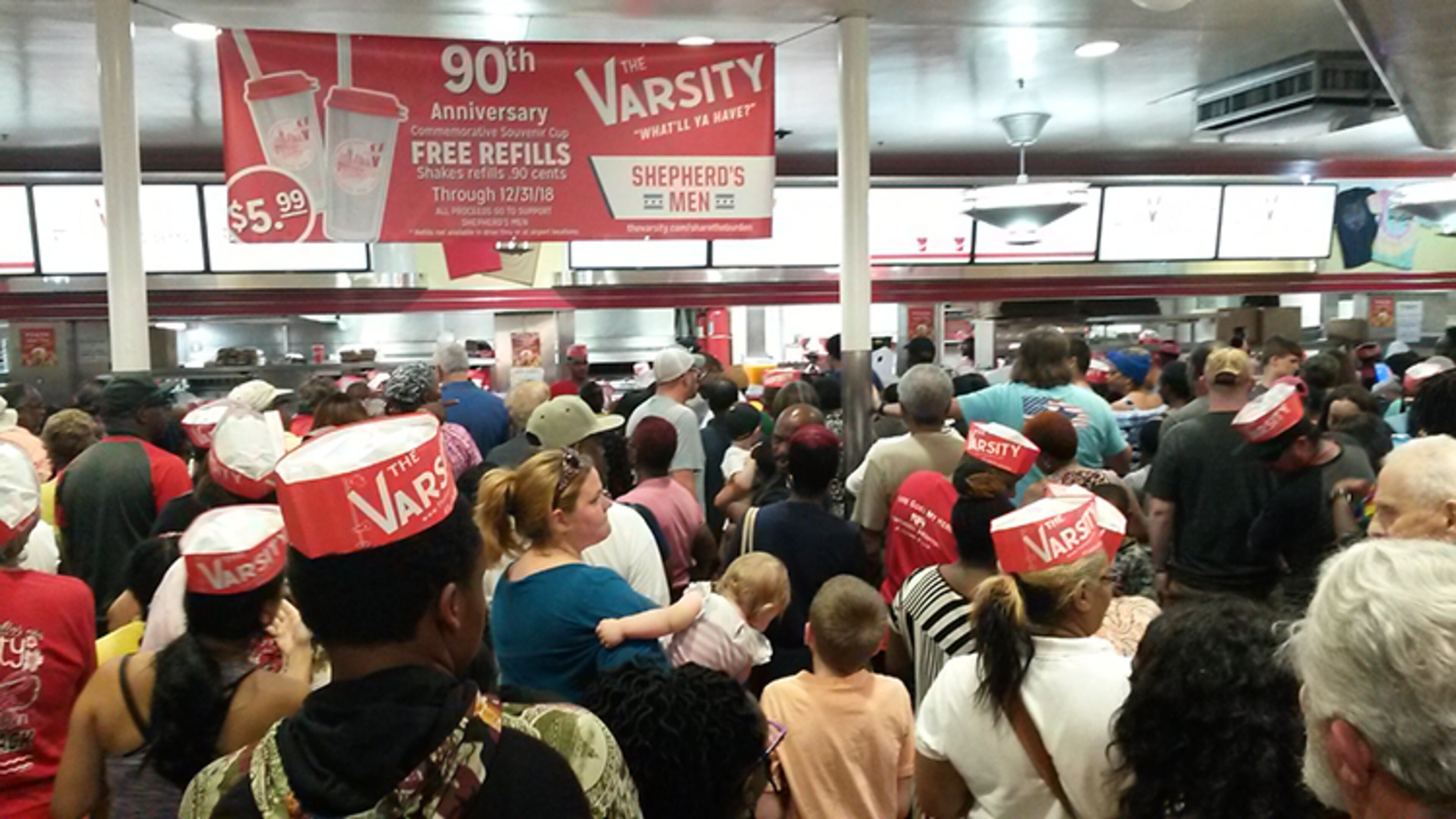 The Varsity held a 90th birthday celebration on Saturday, Aug. 18, 2018, at its Atlanta location. Customers were able to order any item off the menu for 90 cents to mark the occasion. (Photo: MATT KEMPNER / AJC)