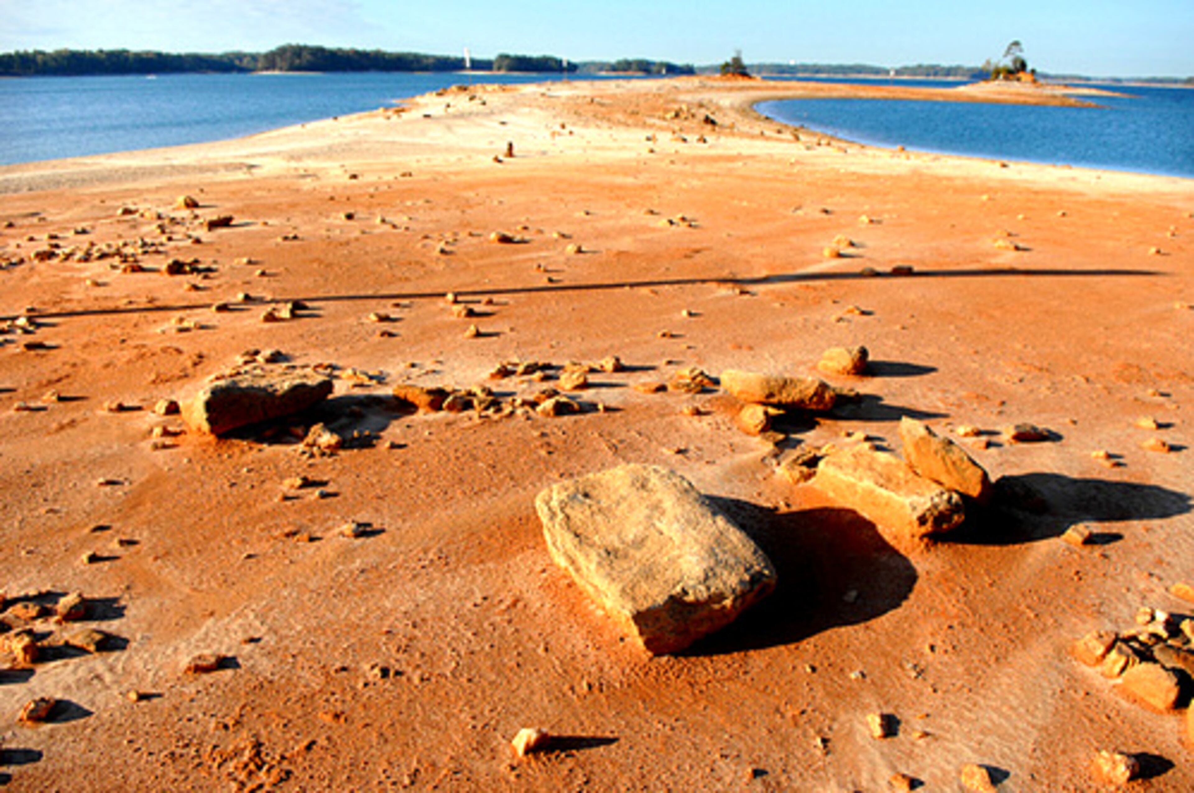 As the drought continues and water levels drop, Lake Lanier reveals more and more of itself. The shoreline grows; the landscape metamorphoses into the surreal. A lunar-looking scene appears on a peninsula, exposed by the lower water, at an area near the Aqualand Marina.