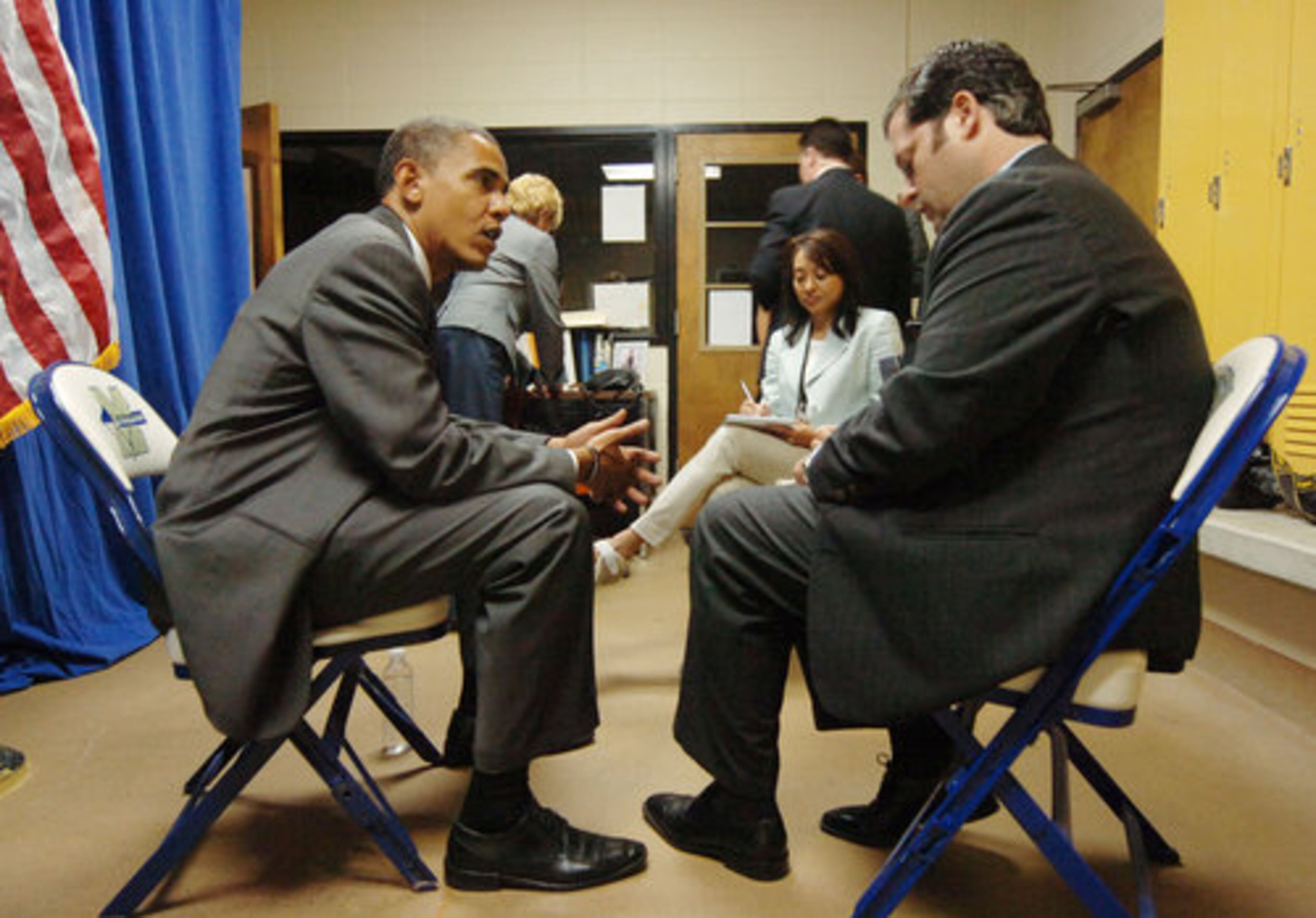 Sen. Barack Obama answers a question posed by AJC reporter Aaron Gould Sheinin after a town hall meeting at McEachern High School.