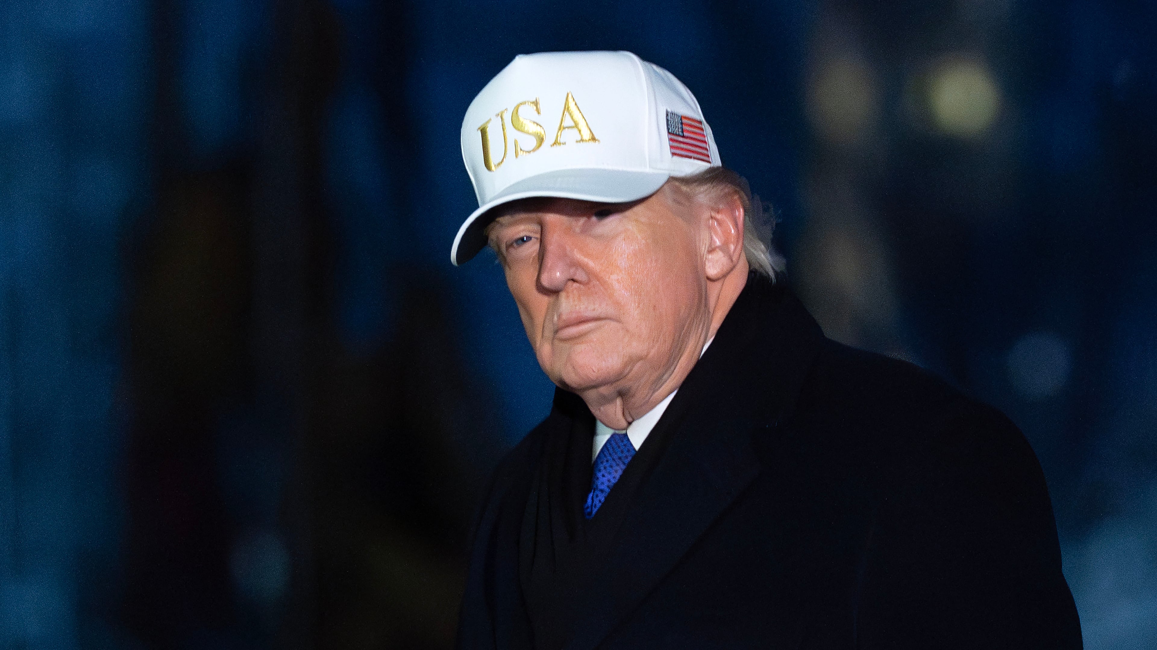 President Donald Trump walks on the South Lawn upon his arrival to the White House, Sunday, Feb. 1, 2026, in Washington. (AP Photo/Jose Luis Magana)