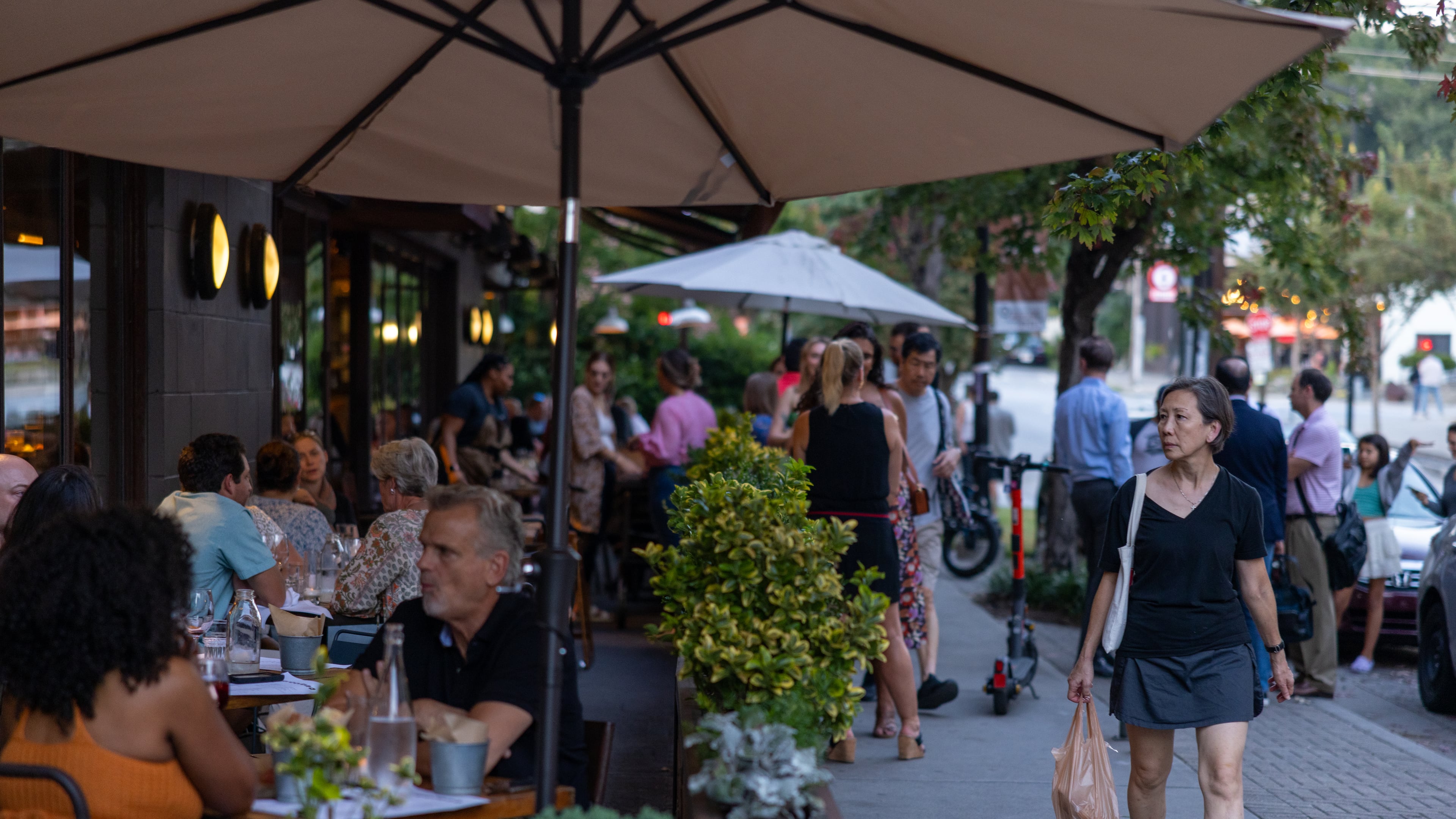 People walking and dining at restaurants at Inman Park on September 19, 2022
