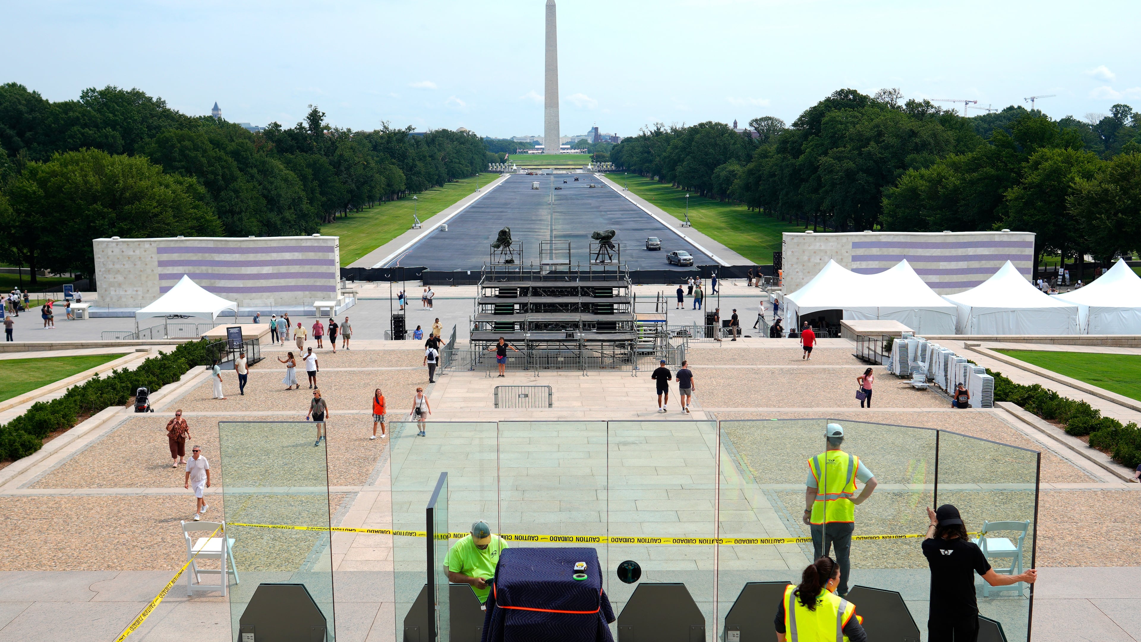 Workers installing bulletproof glass around the podium at the Lincoln Memorial in Washington in preparation are made ahead of tomorrow's anniversary of the March on Washington, Thursday, Aug. 27, 2026. (Photo/Pablo Martinez Monsivais)