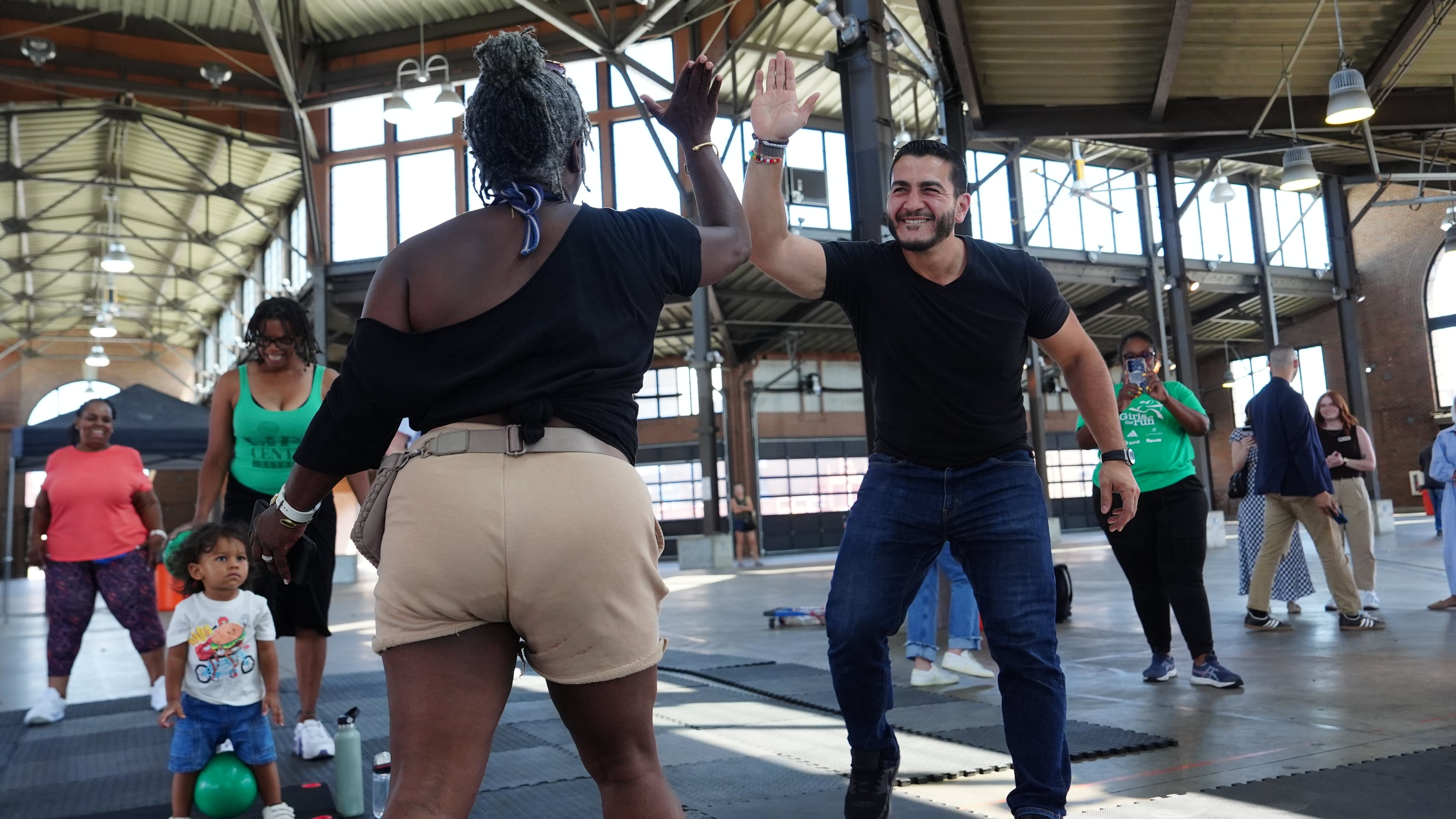 Abdul El-Sayed, a progressive candidate in the Democratic primary for U.S. Senate in Michigan, visits Eastern Market on election day, Tuesday, Aug. 4, 2026, in Detroit. (AP Photo/Julia Demaree Nikhinson)