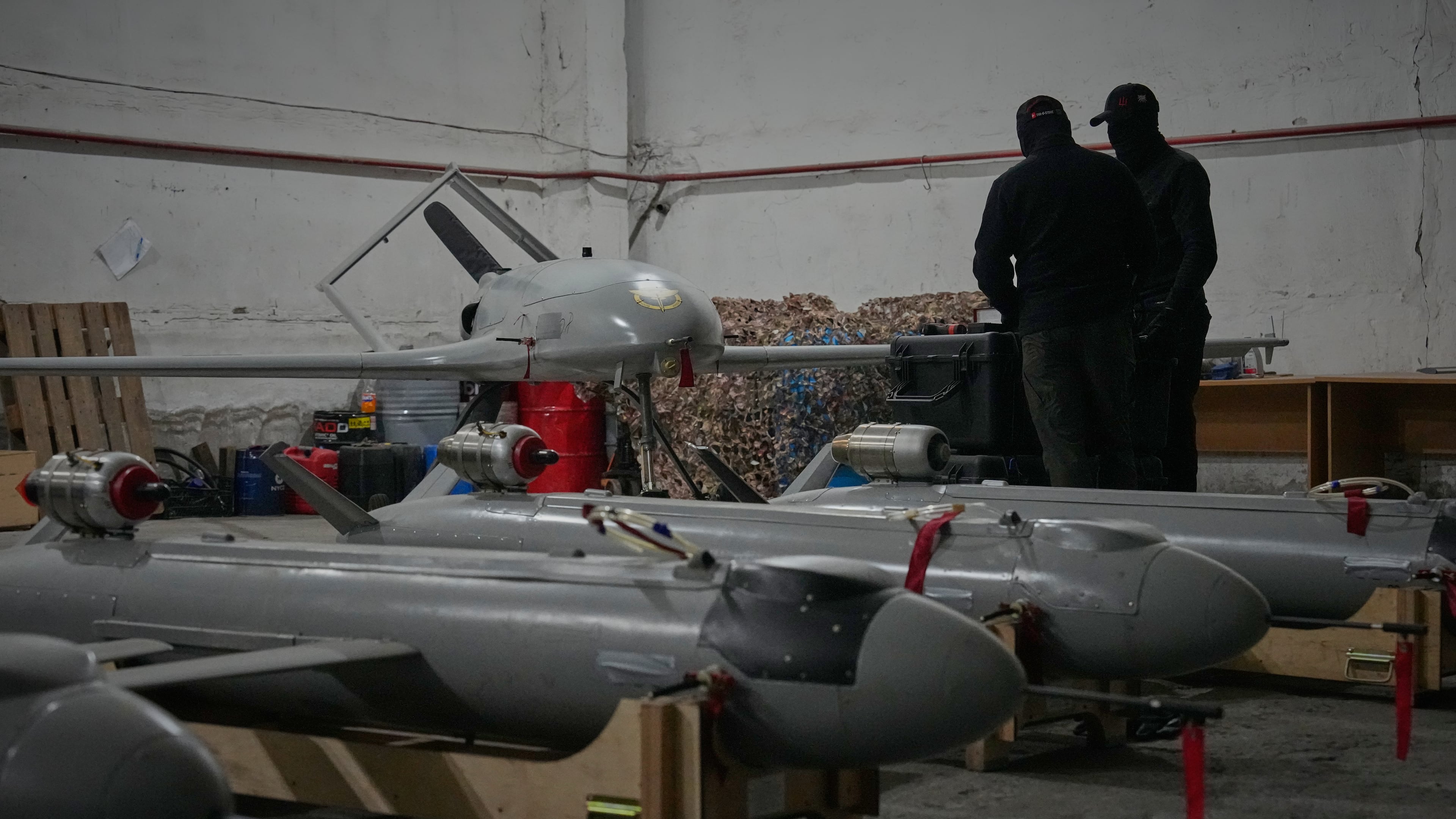 Servicemen of Ukraine's defense intelligence set up drones against Russian in an undisclosed location in Ukraine late Thursday, May 28, 2026. (AP Photo/Efrem Lukatsky)