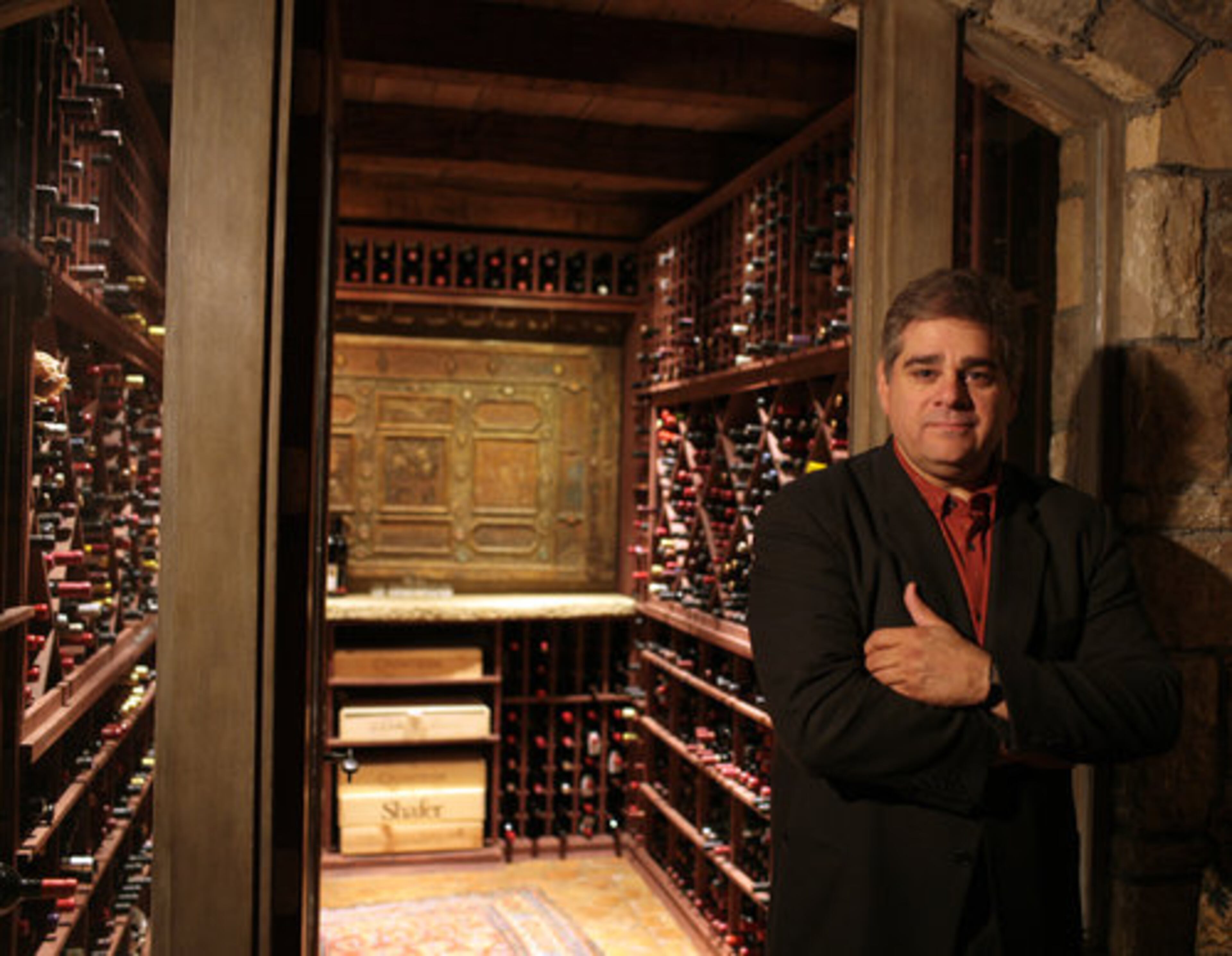 Celebrity photographer Denis Reggie also wanted his wine cellar to be a trip back in time. "You go from this traditional house through old iron gates and it's like you're taking a trip to Europe a century ago," said Reggie. "I love it."