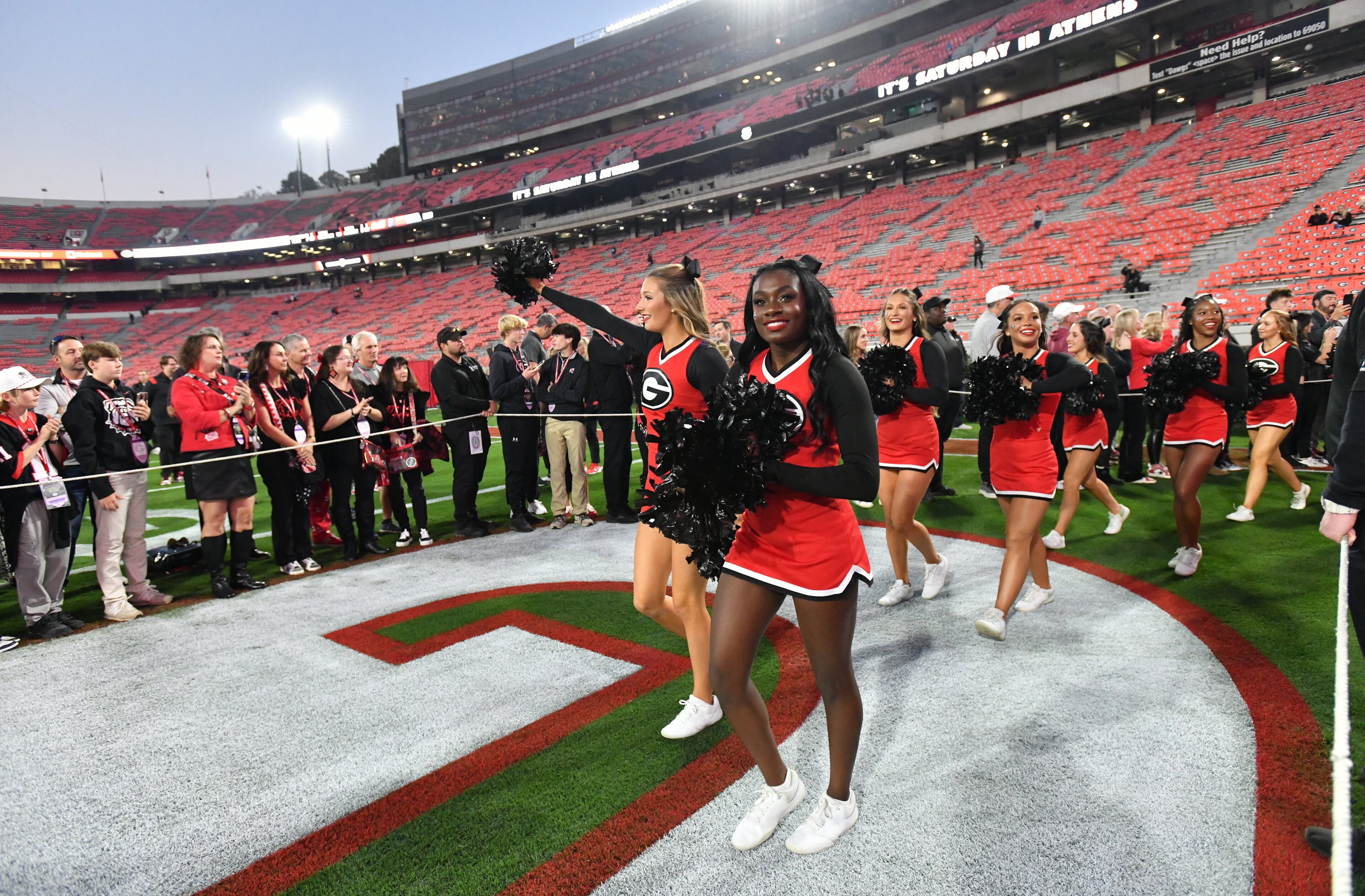 Georgia cheerleaders enter during Dawgs Walk before an NCAA football game between Georgia and Tennessee at Sanford Stadium, Saturday, November 16, 2024, in Athens. (Hyosub Shin / AJC)