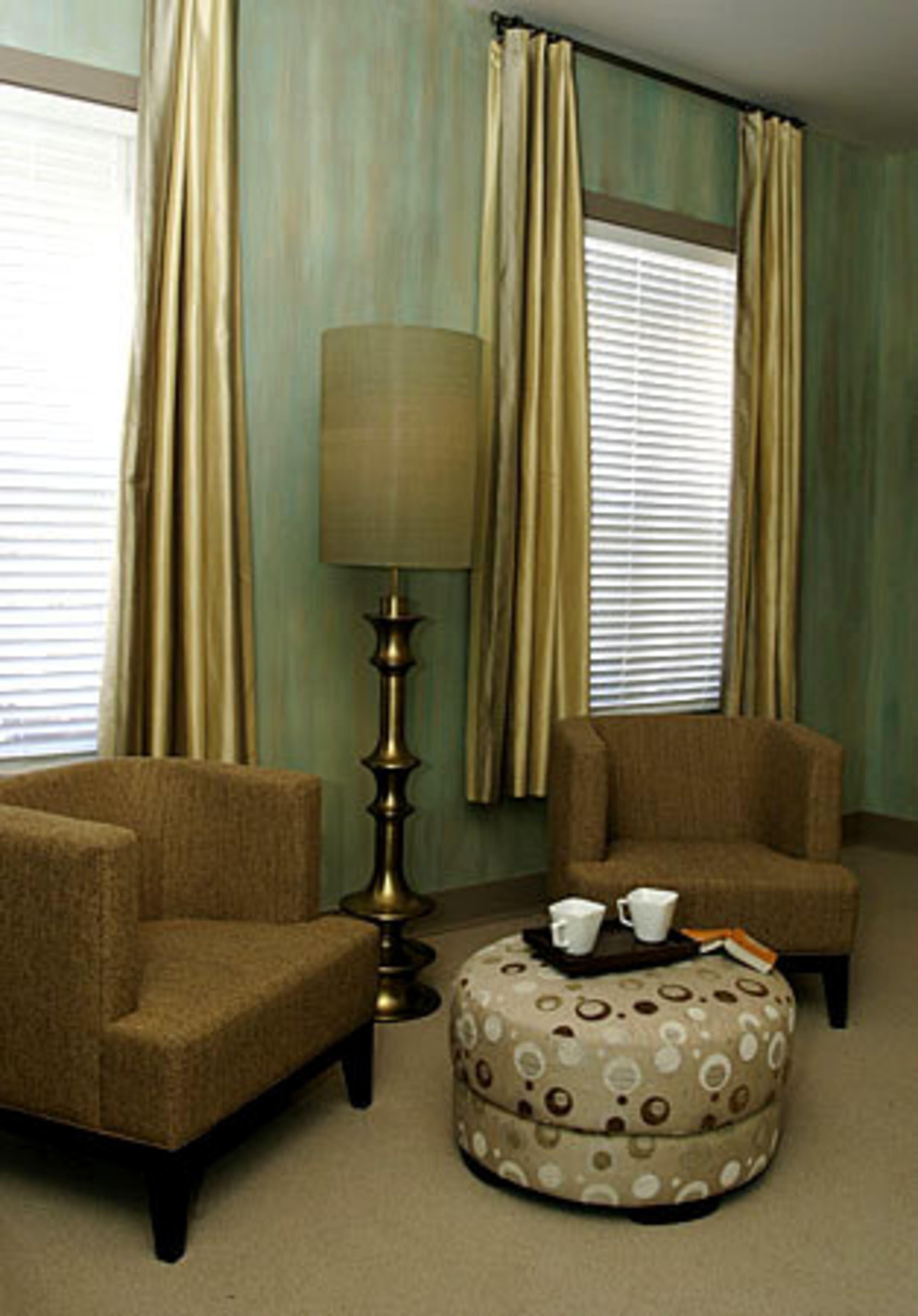 The master suite of the Peterson's home features an elaborate faux finish by Tobey Sanders of Faux Decor.