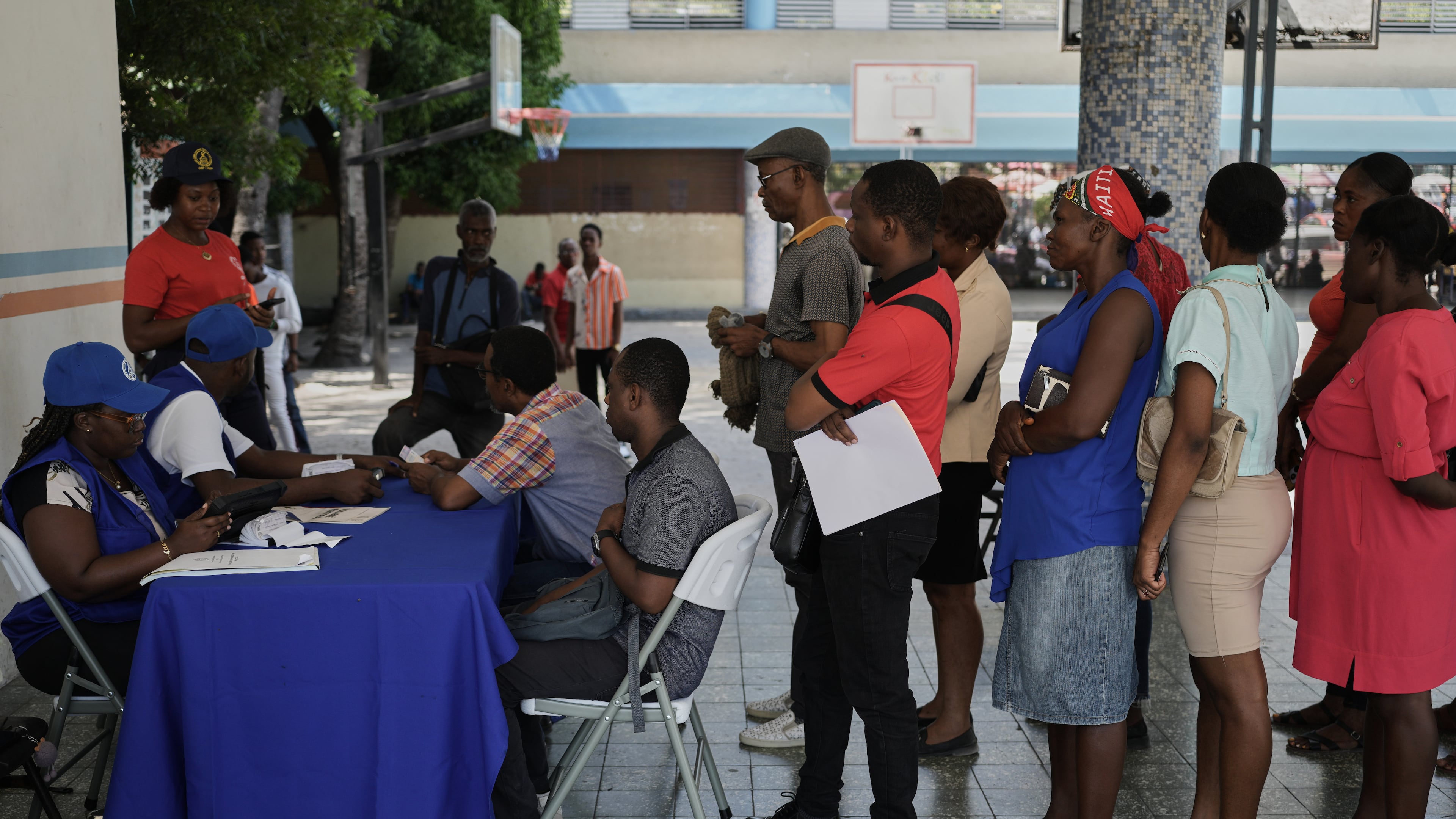 Haitians register to vote in the upcoming general election in Port-au-Prince, Haiti, Friday, July 31, 2026. (AP Photo/Odelyn Joseph)
