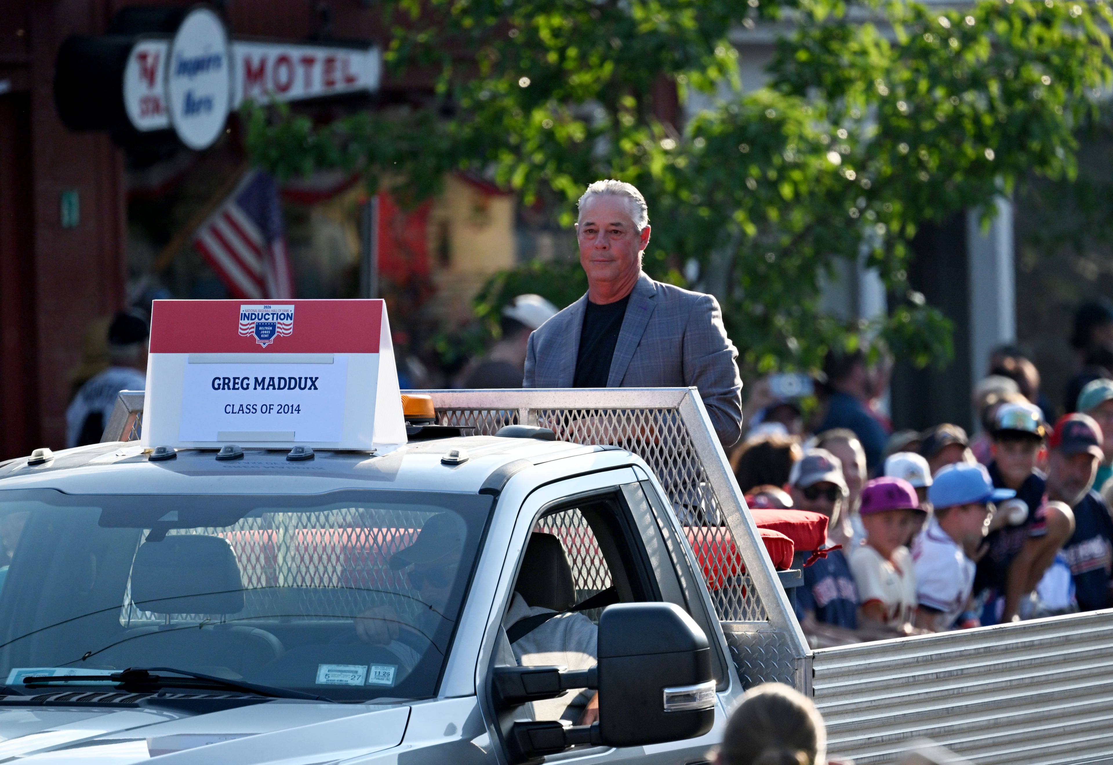 National Baseball Hall of Fame member and former Brave Greg Maddux rides in the Hall of Fame Legends Parade on Saturday, July 25, 2026, in Cooperstown, N.Y. (Hyosub Shin/AJC)
