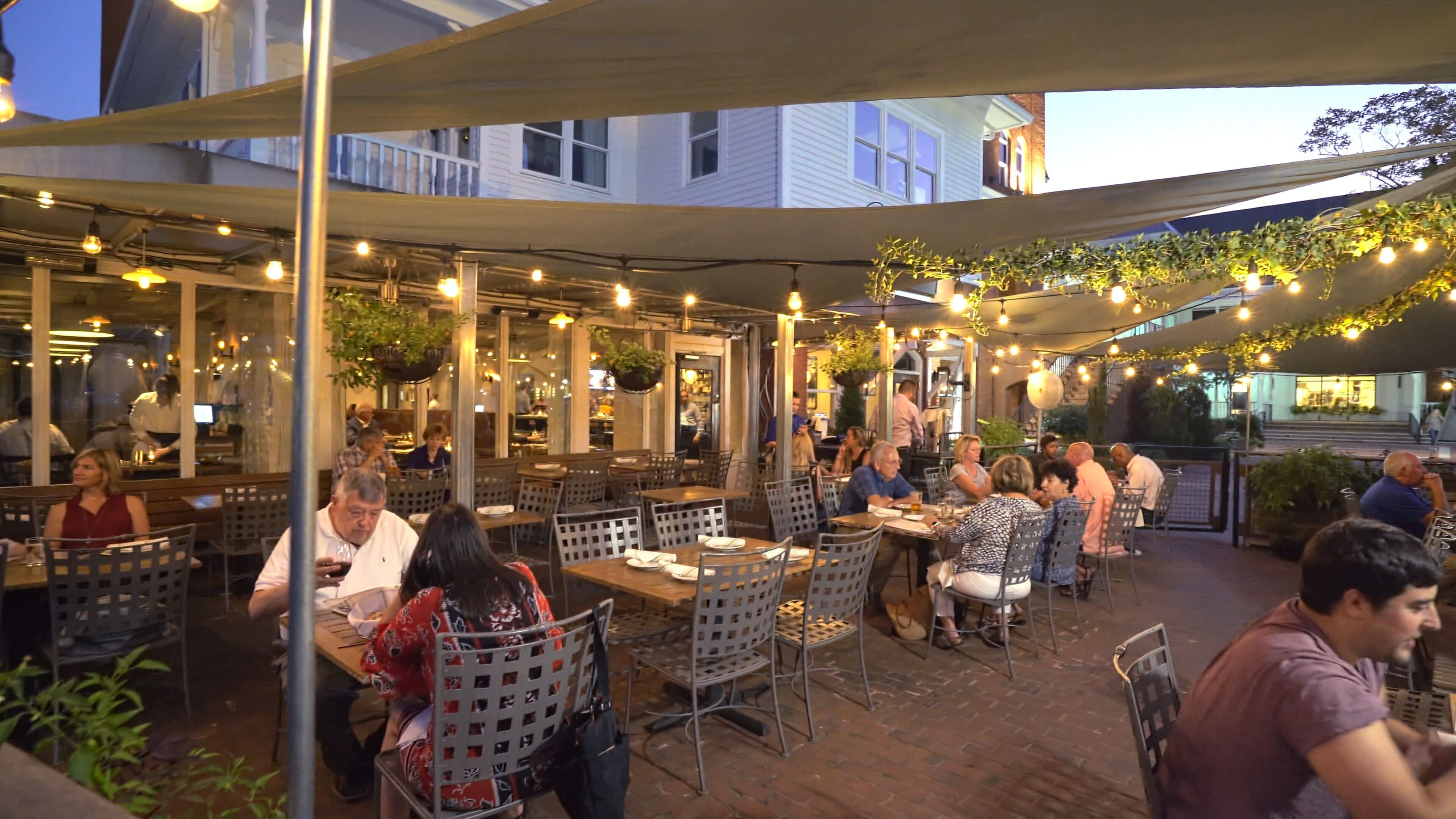Tables on the patio at Paces & Vine have been spread out to facilitate social distancing. Courtesy of Paces & Vine