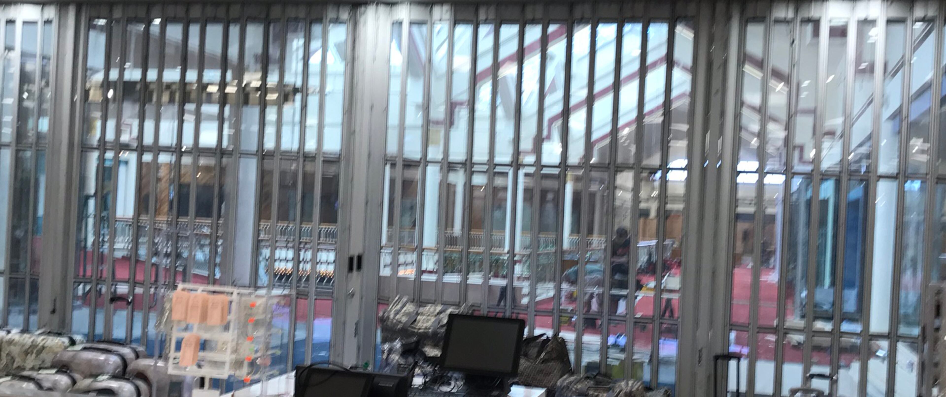 I took a not-so-clear surreptitious shot of the interior upstairs space of what was Starcourt Mall on the morning of Wednesday, July 10, 2019, two days after Netflix began dismantling everything. There isn't much to see with all the store signage down.